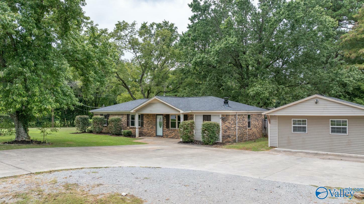 Property Photo:  910 Moontown Road  AL 35741 