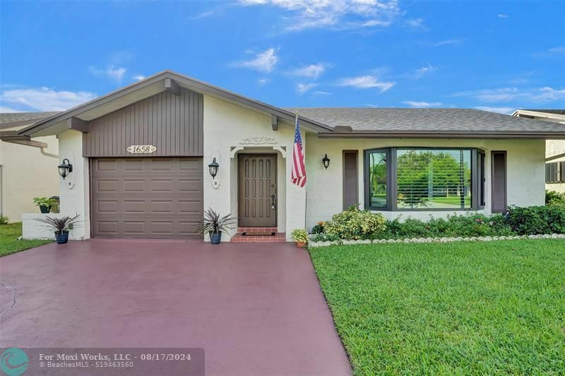 Property Photo:  1658 SW 19th Ave  FL 33442 