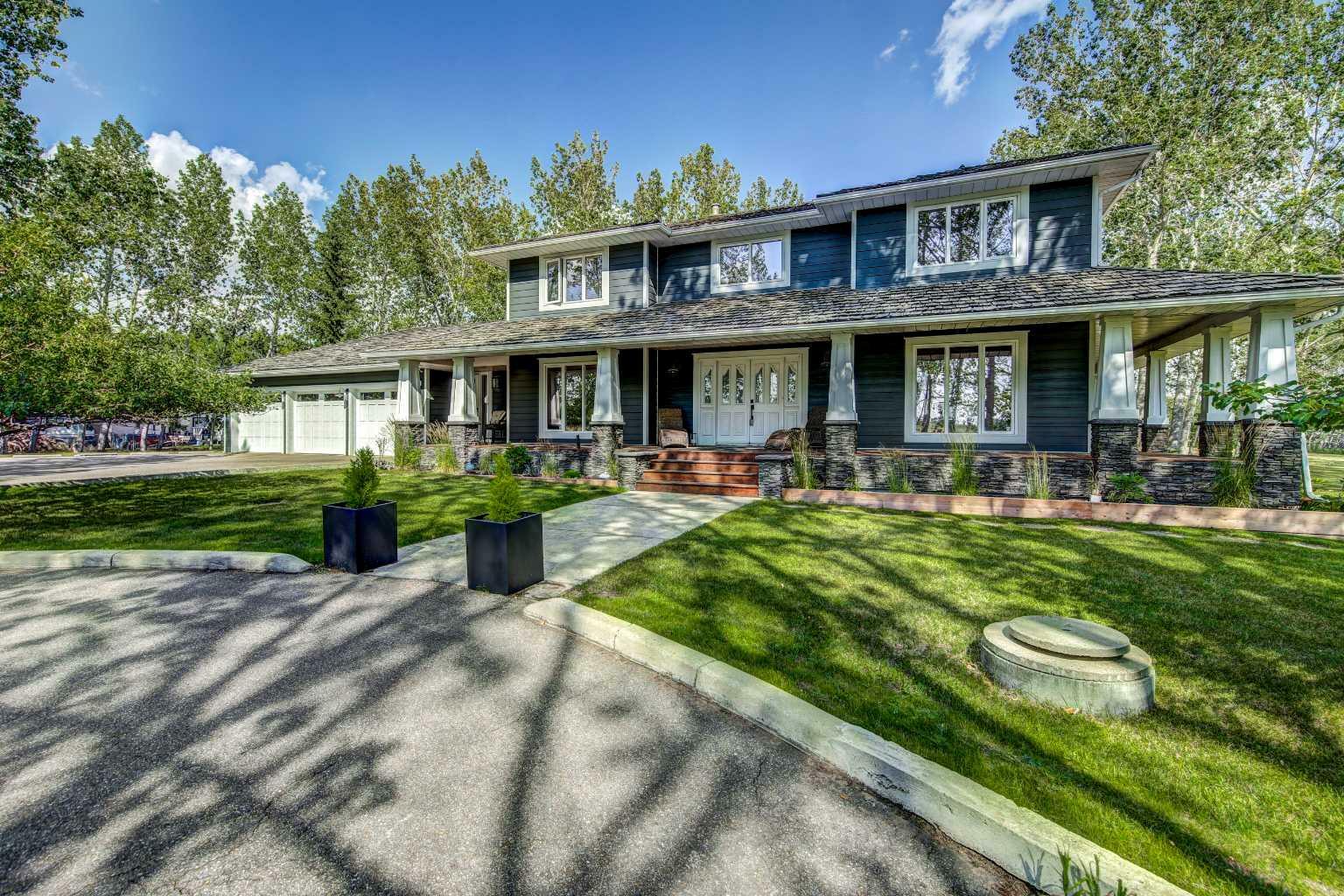 Property Photo:  263236 Range Road 293  AB T4A 0N3 