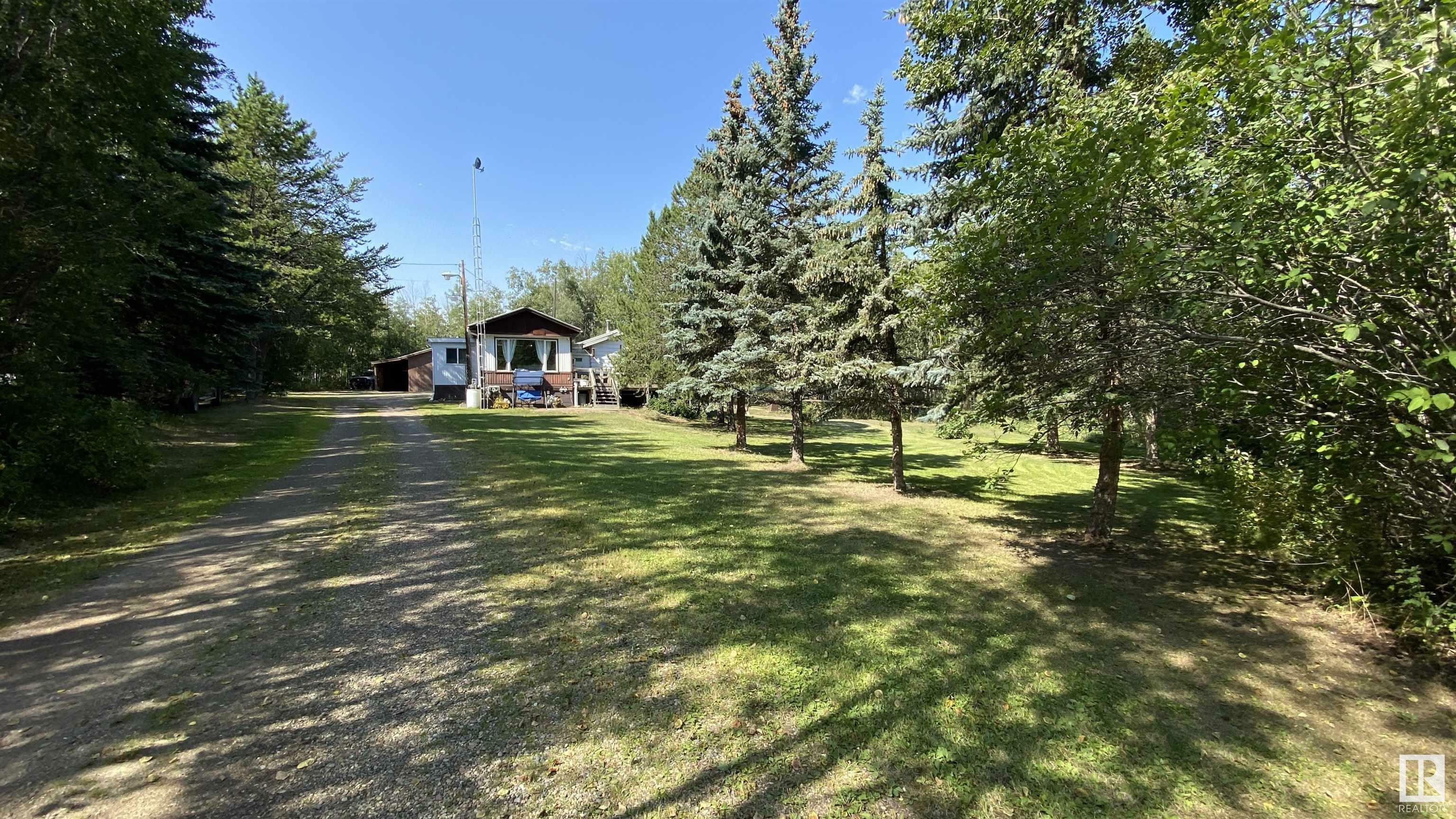 Property Photo:  11124 Twp Rd 595 106  AB T0A 0C0 