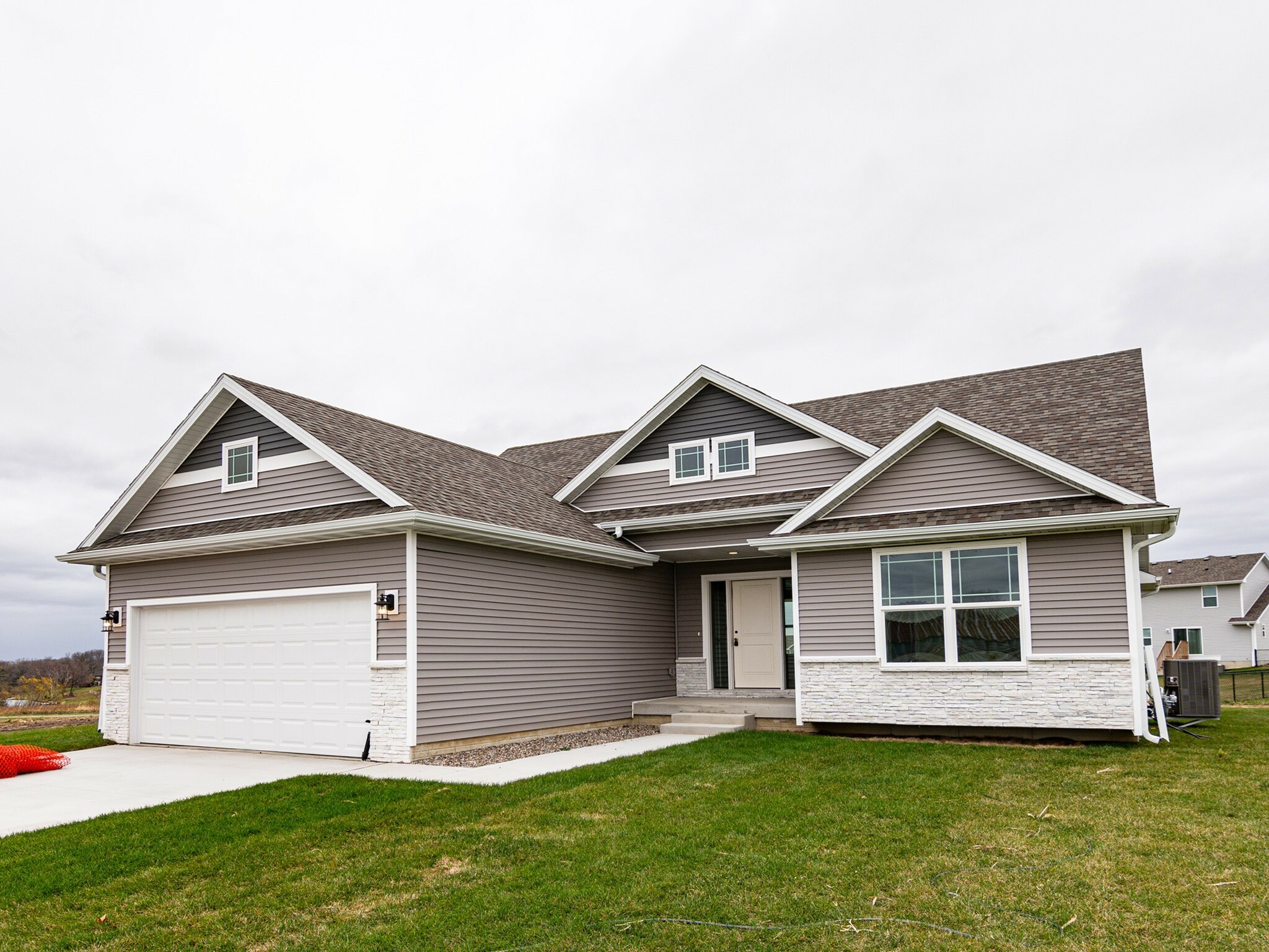 Property Photo:  115 All Saints Drive  IA 50250 