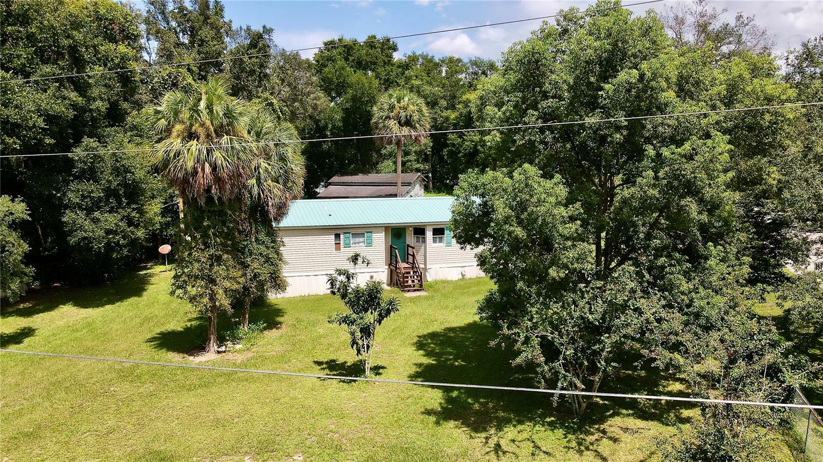 Property Photo:  10767 SE 130th Lane  FL 32179 