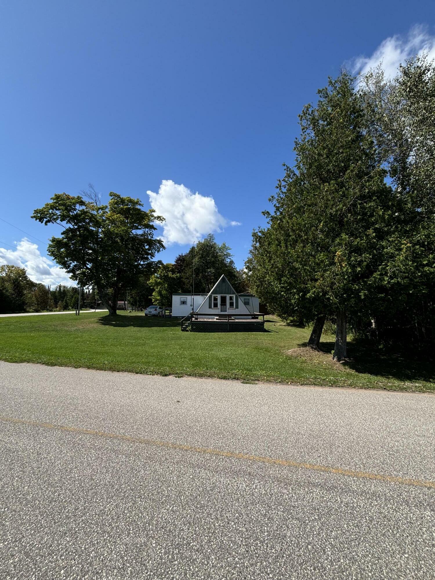 Property Photo:  26816 Point Aux Frenes Rd  MI 49736 