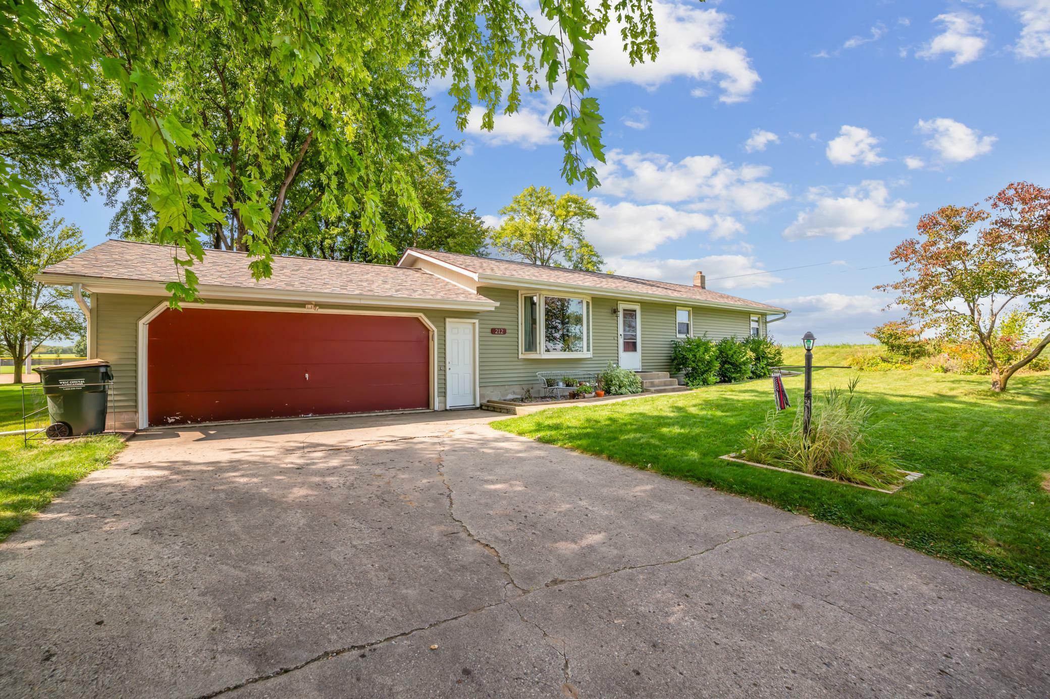 Property Photo:  212 3rd Avenue NW  MN 55370 