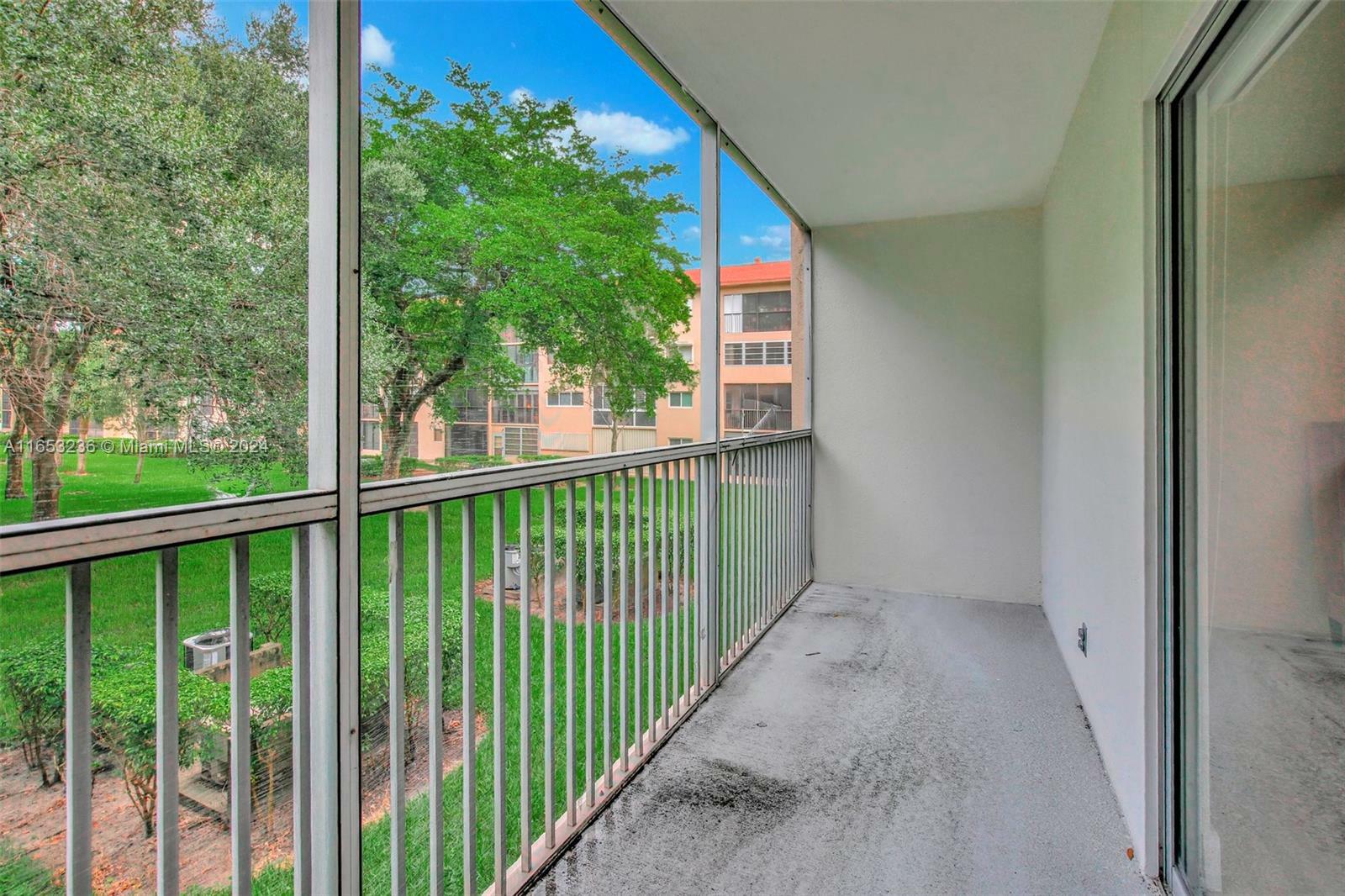 Property Photo:  1551 SW 135th Ter 212G  FL 33027 