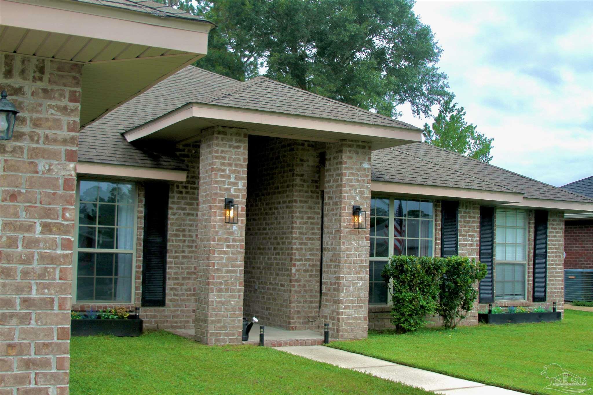 Property Photo:  9771 Harlington St  FL 32533 