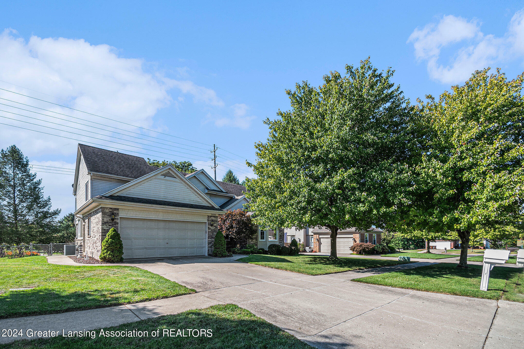 Property Photo:  1609 Downing Street  MI 48840 