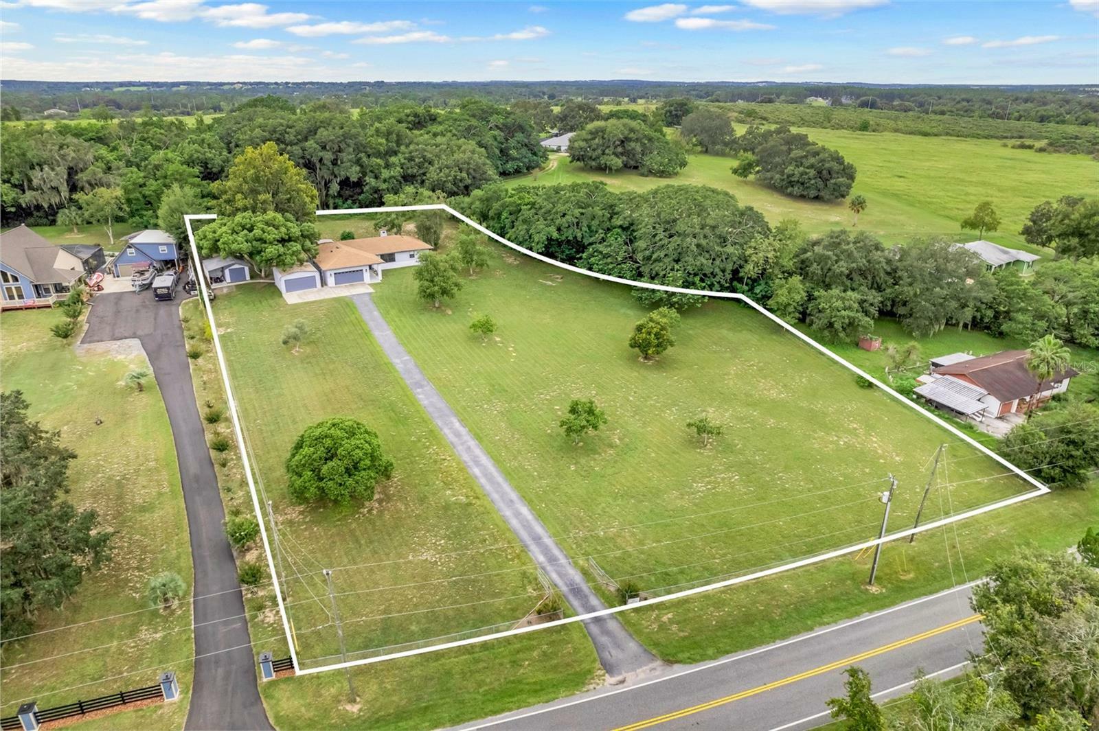 Property Photo: 10822 E Revels Road FL 34737