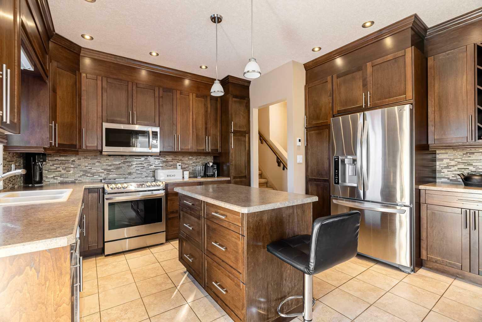 Property Photo:  140 Brosseau Crescent  AB T9K 2G8 