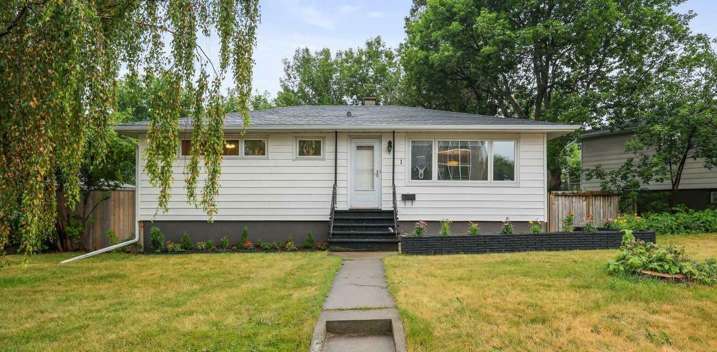 Property Photo:  1 Meadowview Road SW  AB T2V 1V9 