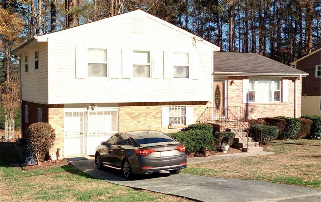 Property Photo:  6695 Hidden Brook Trail  GA 30349 