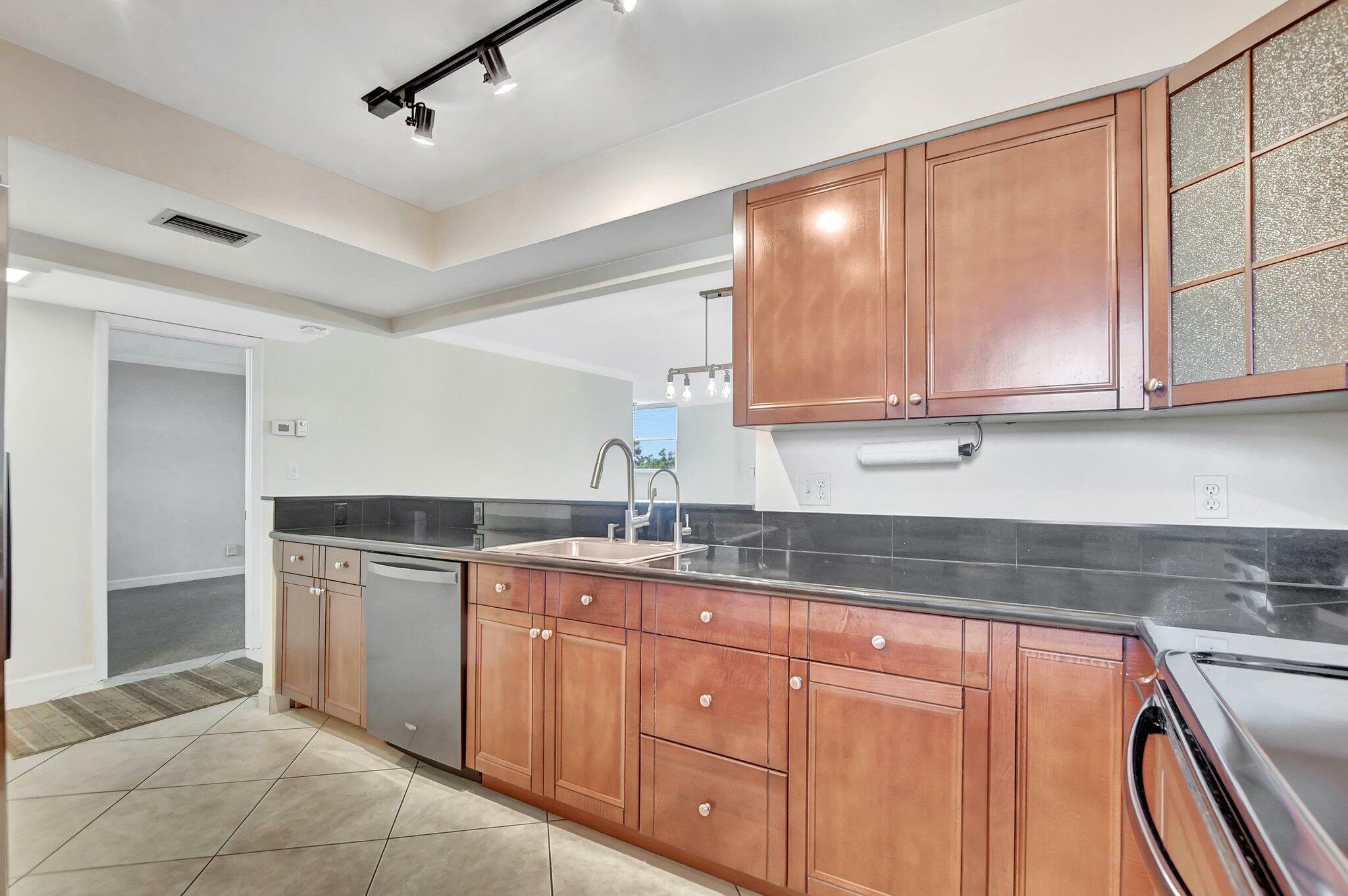 Property Photo:  6461 NW 2nd Avenue 516  FL 33487 