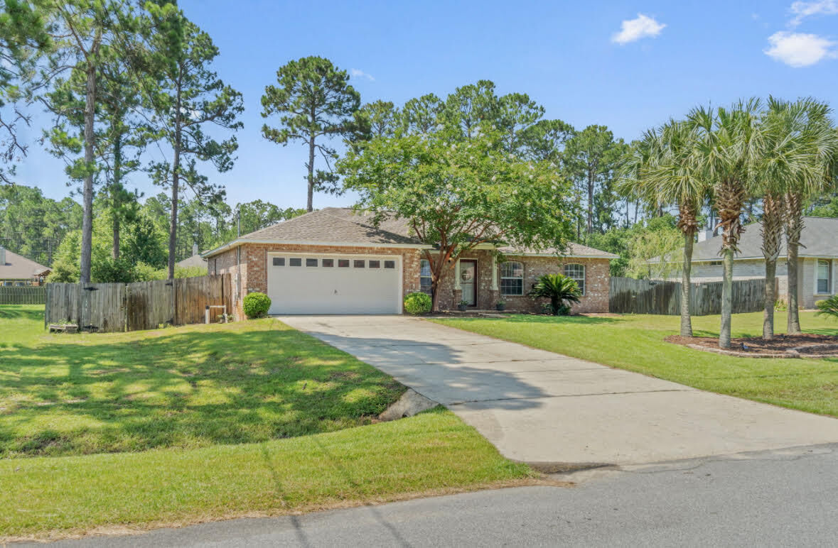 Property Photo:  7047 Jasper Street  FL 32566 
