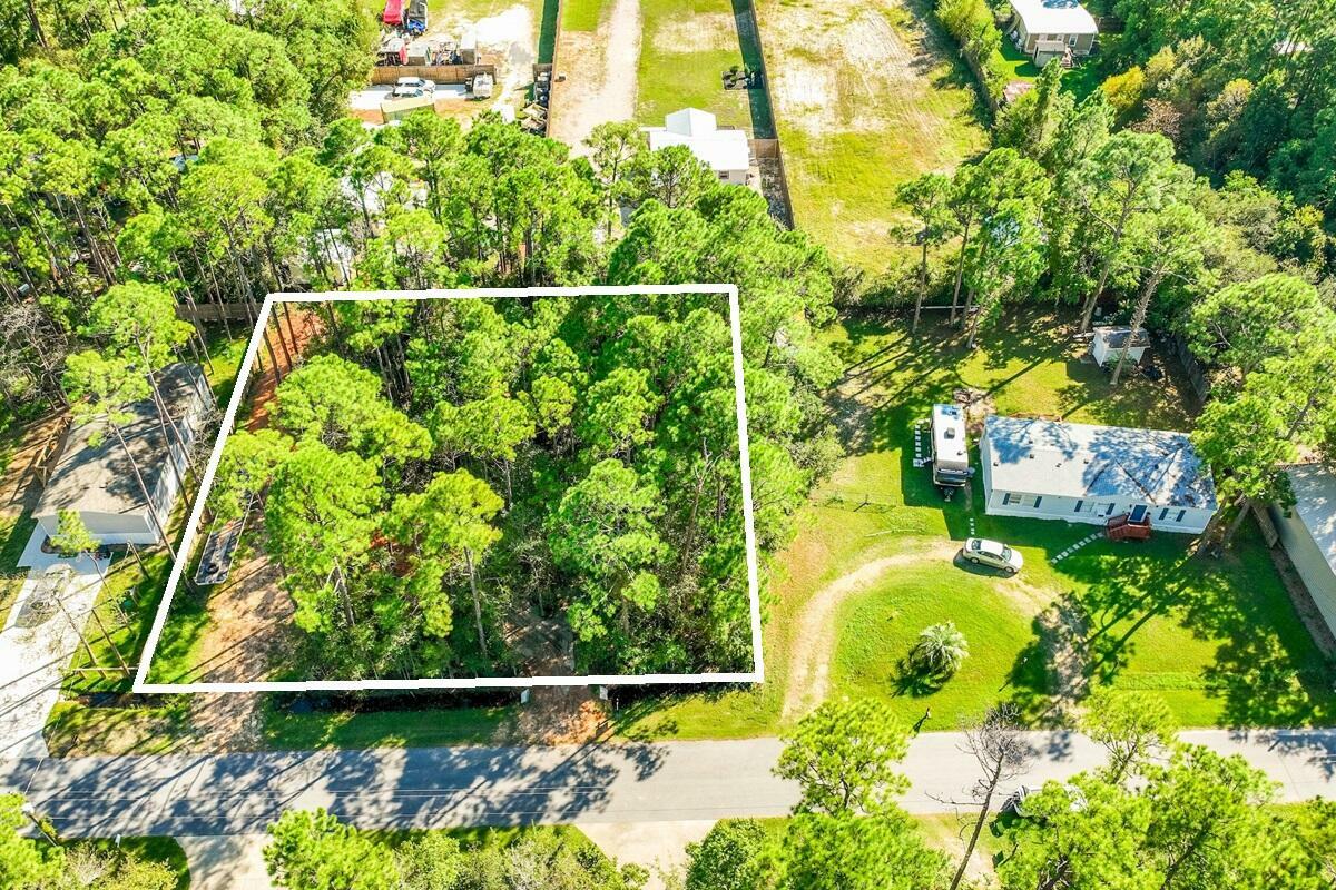 Property Photo:  Xs Nikki Circle  FL 32459 