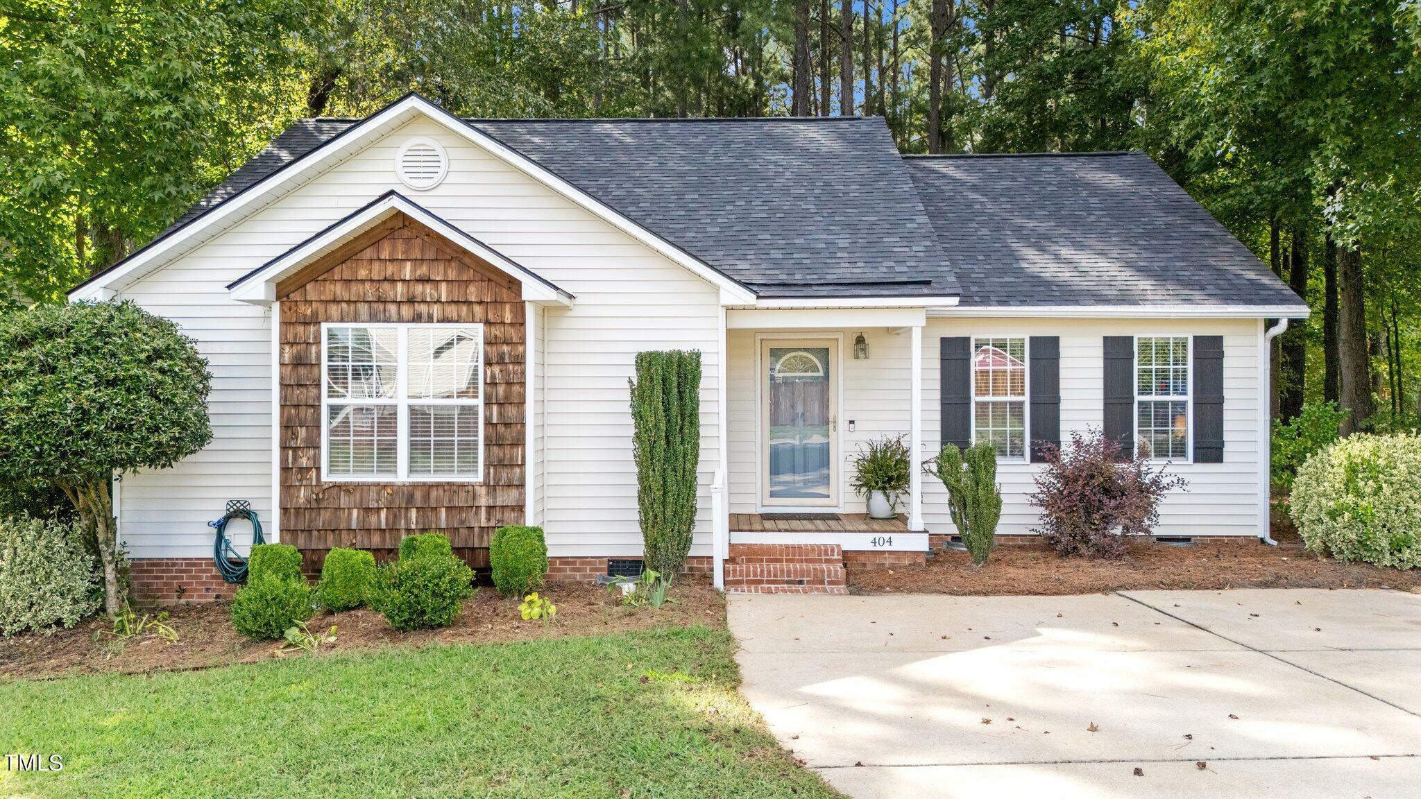 Property Photo:  404 Pinecroft Drive  NC 27520 