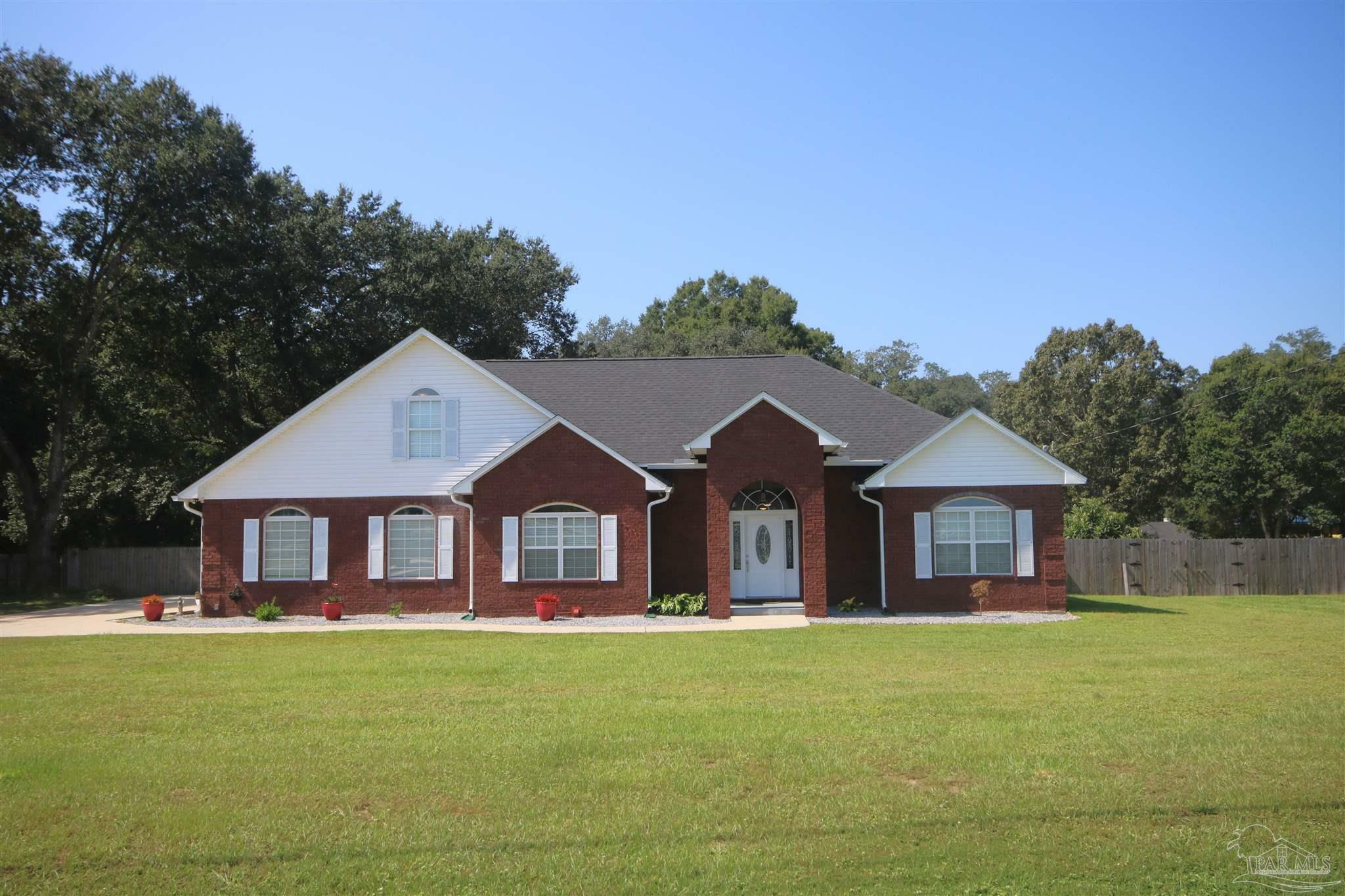 Property Photo:  5895 Quintette Rd  FL 32571 