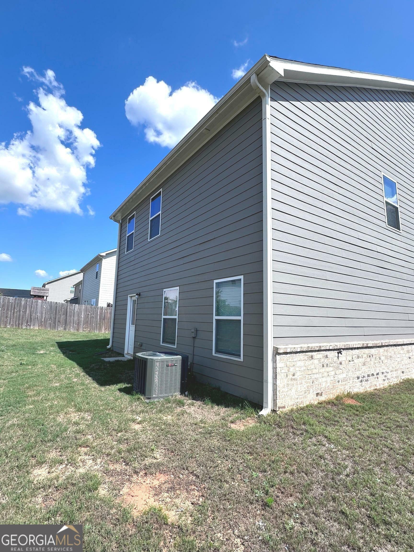 Property Photo:  628 Gleaner Way  GA 30248 