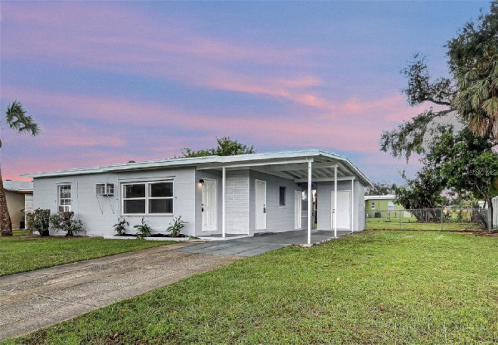 Property Photo: 2513 Elkcam Boulevard FL 33952