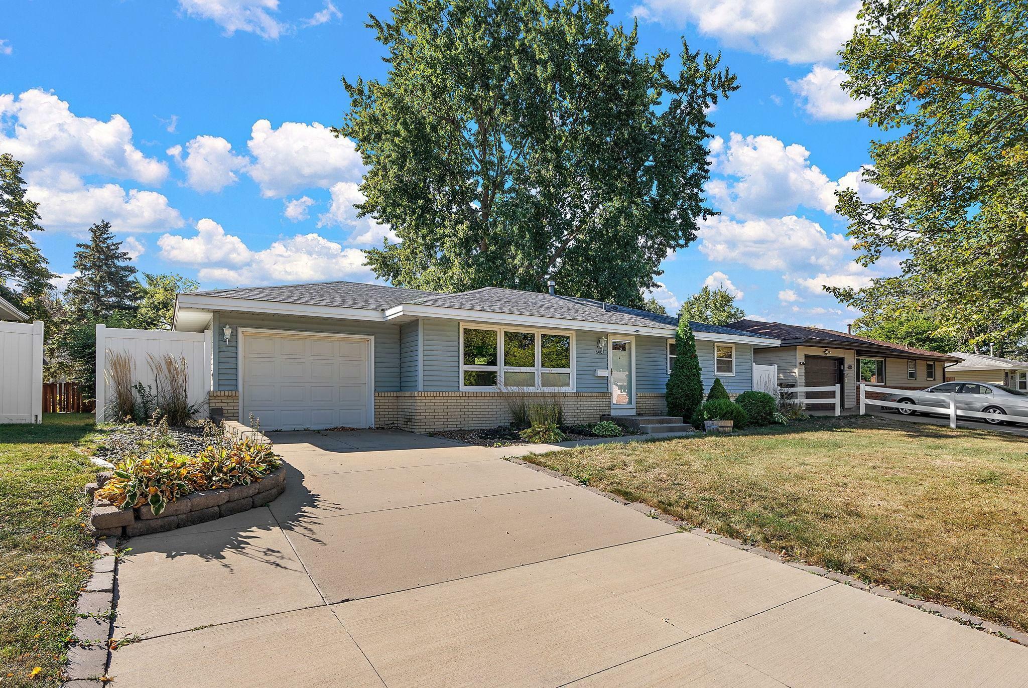 Property Photo:  6407 61st Avenue N  MN 55428 