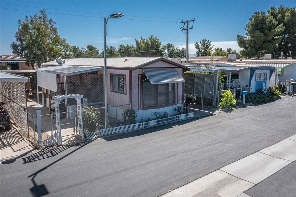 Property Photo:  14411 Palmdale Road 60  CA 92392 