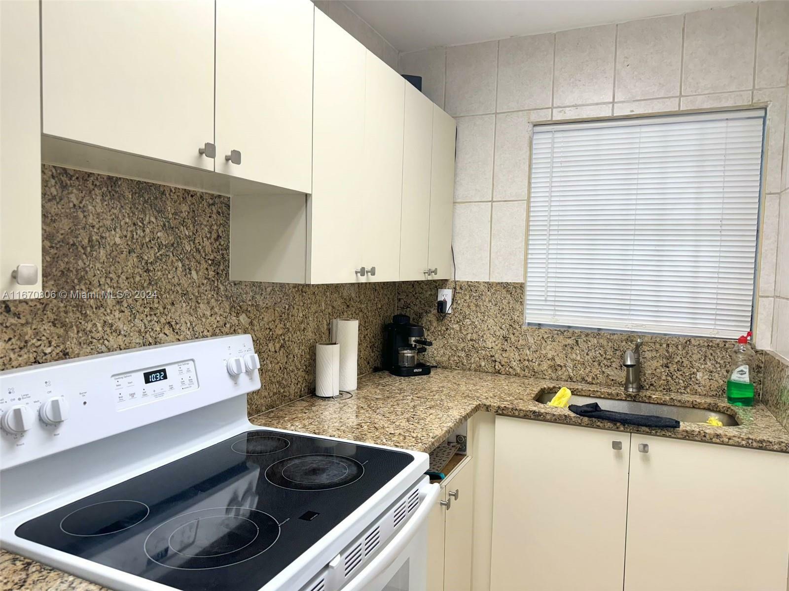 Property Photo:  305 W 68th St 301  FL 33014 