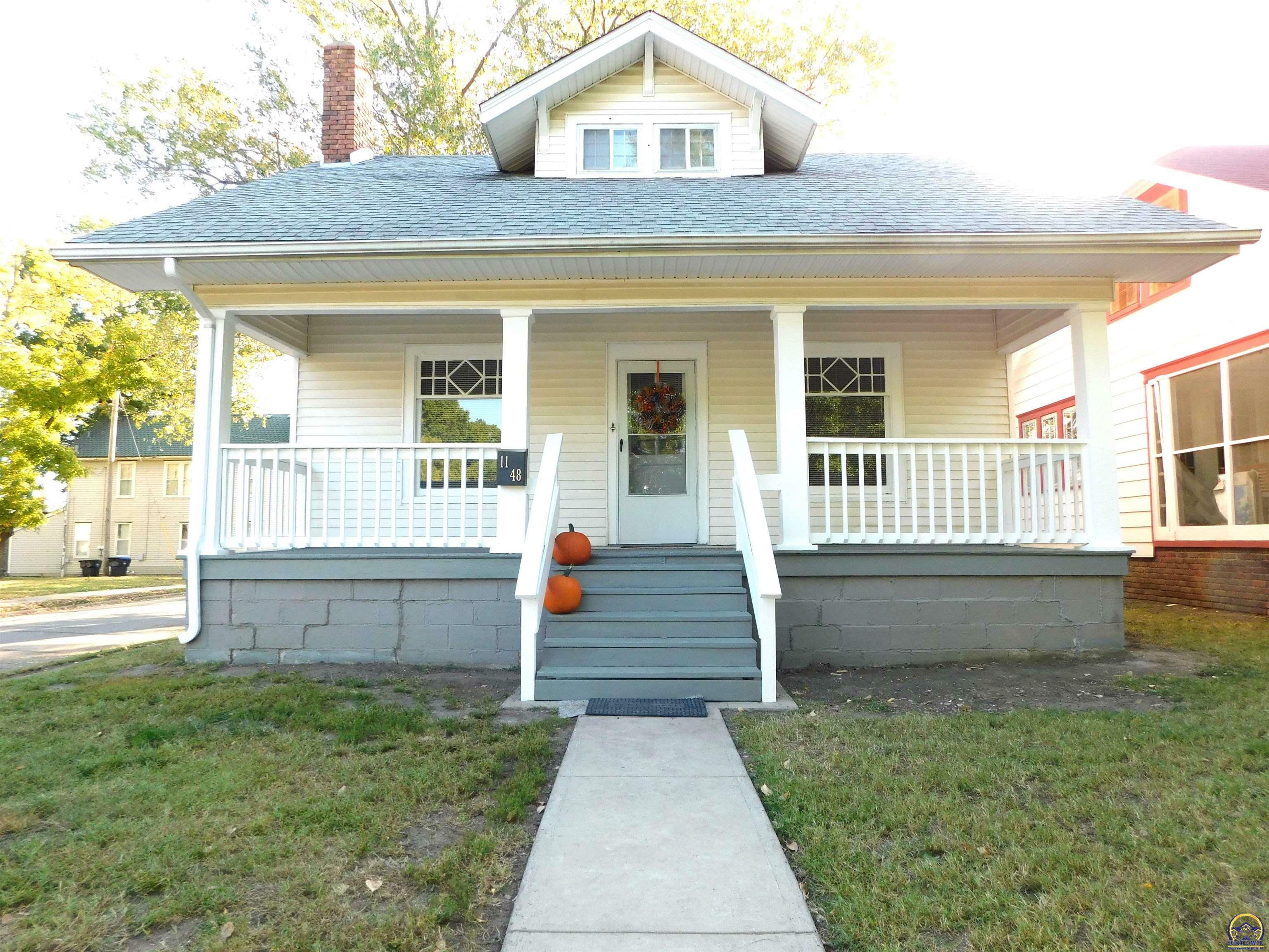 Property Photo:  1148 SW College Ave  KS 66604 