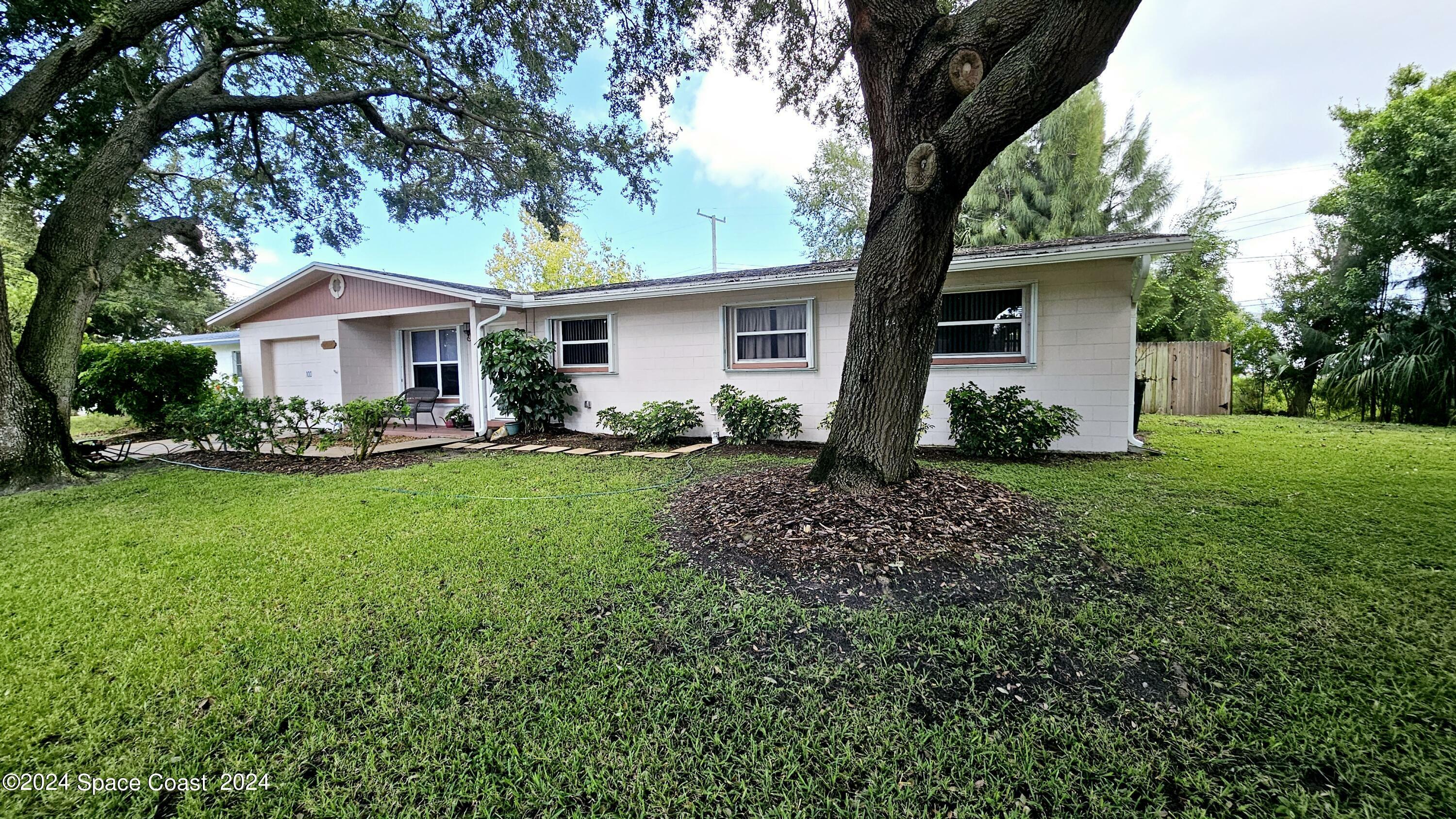 Property Photo:  100 N Tropical Way  FL 32952 