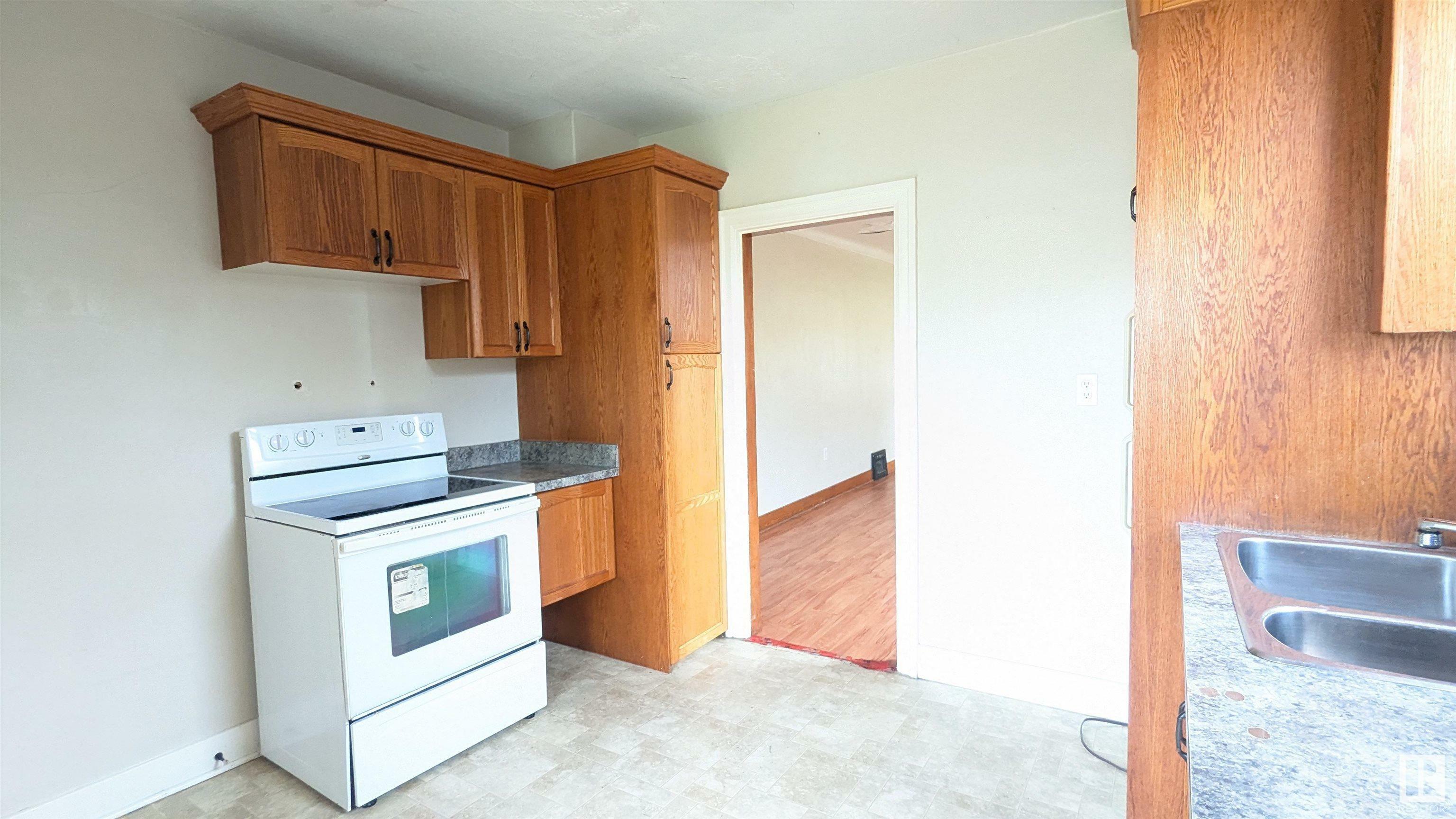 Property Photo:  5038 49 Avenue  AB T9C 1L9 