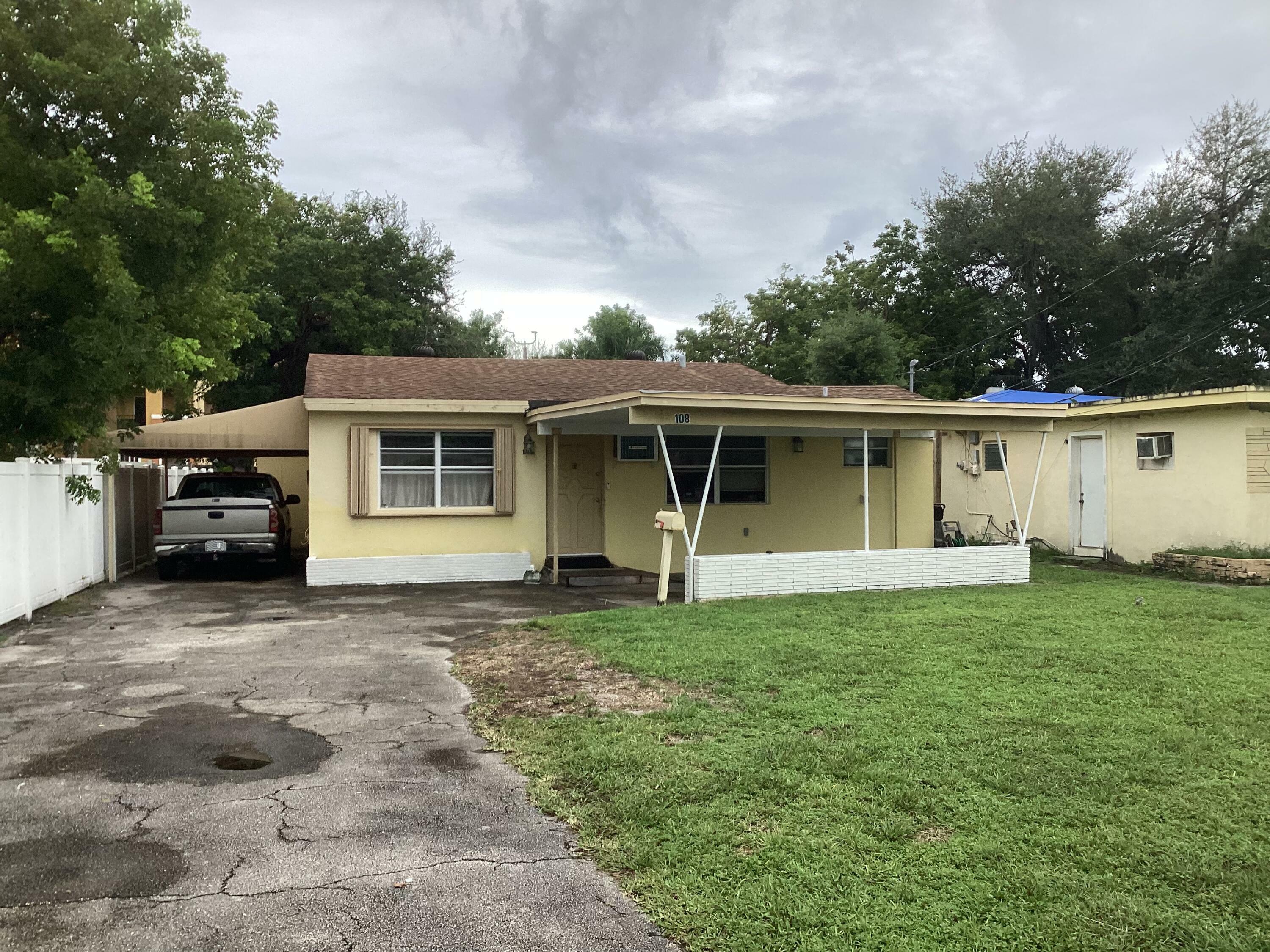 Property Photo:  108 NW 3rd Avenue  FL 33009 