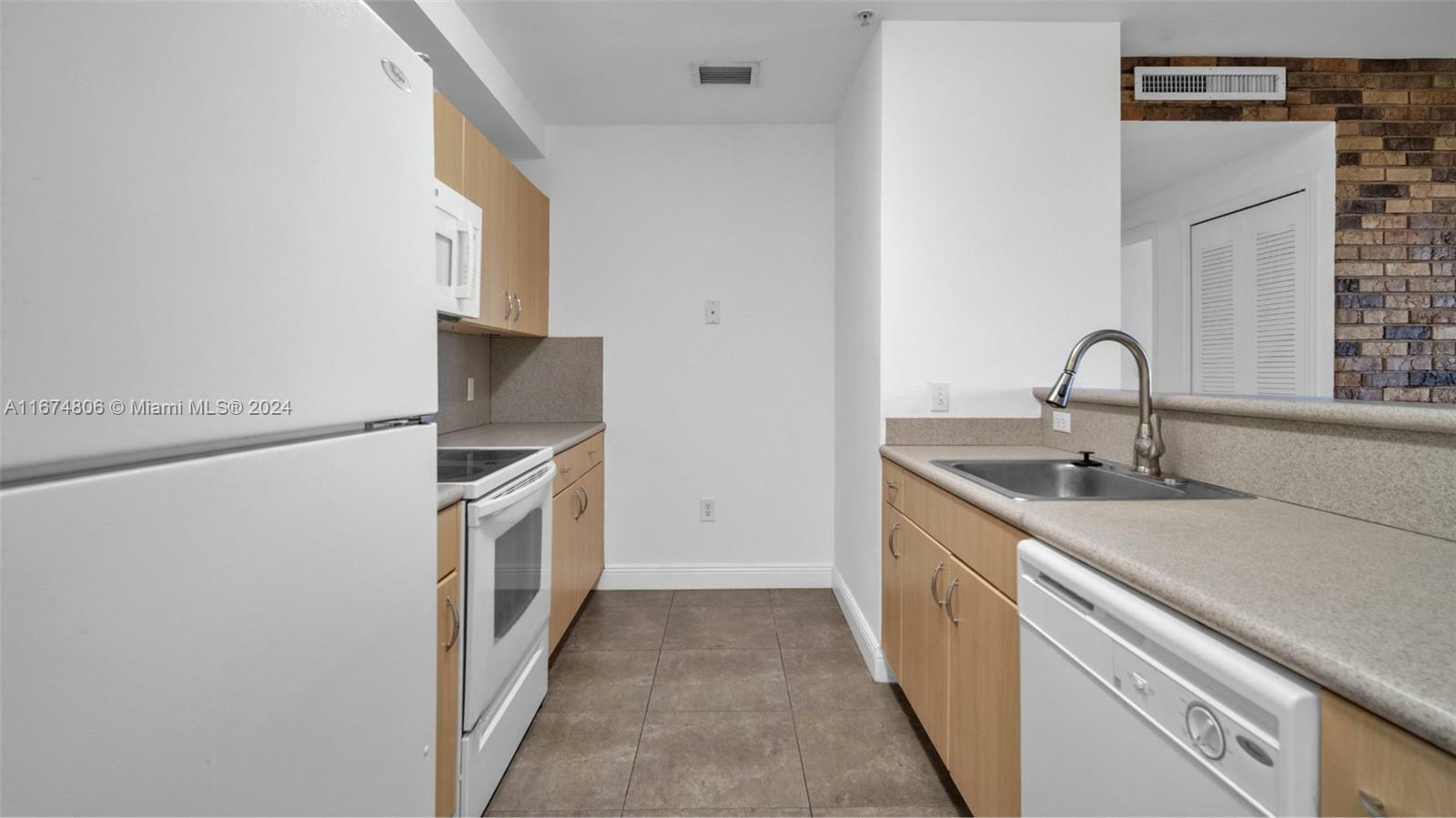 Property Photo:  2400 SW 27th Ave 604  FL 33145 