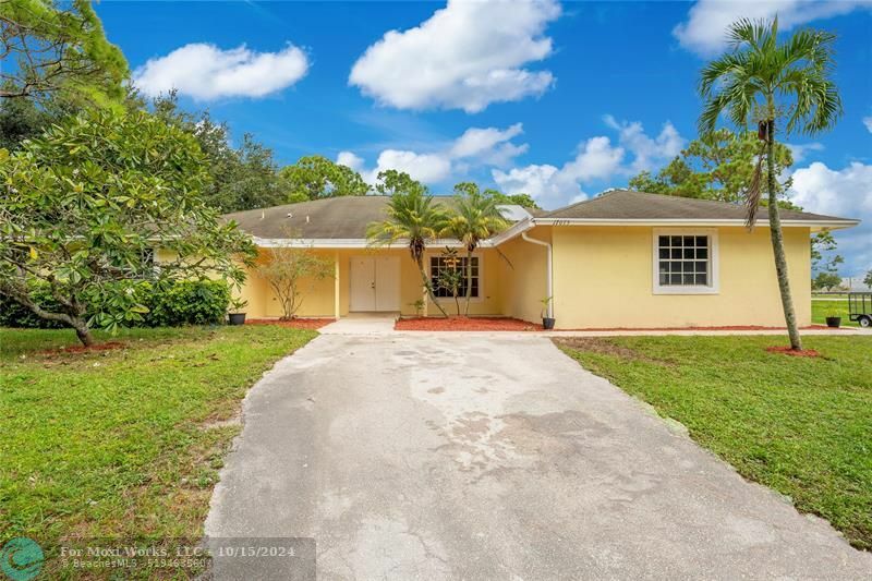 Property Photo:  17075 Orange Grove Blvd  FL 33470 