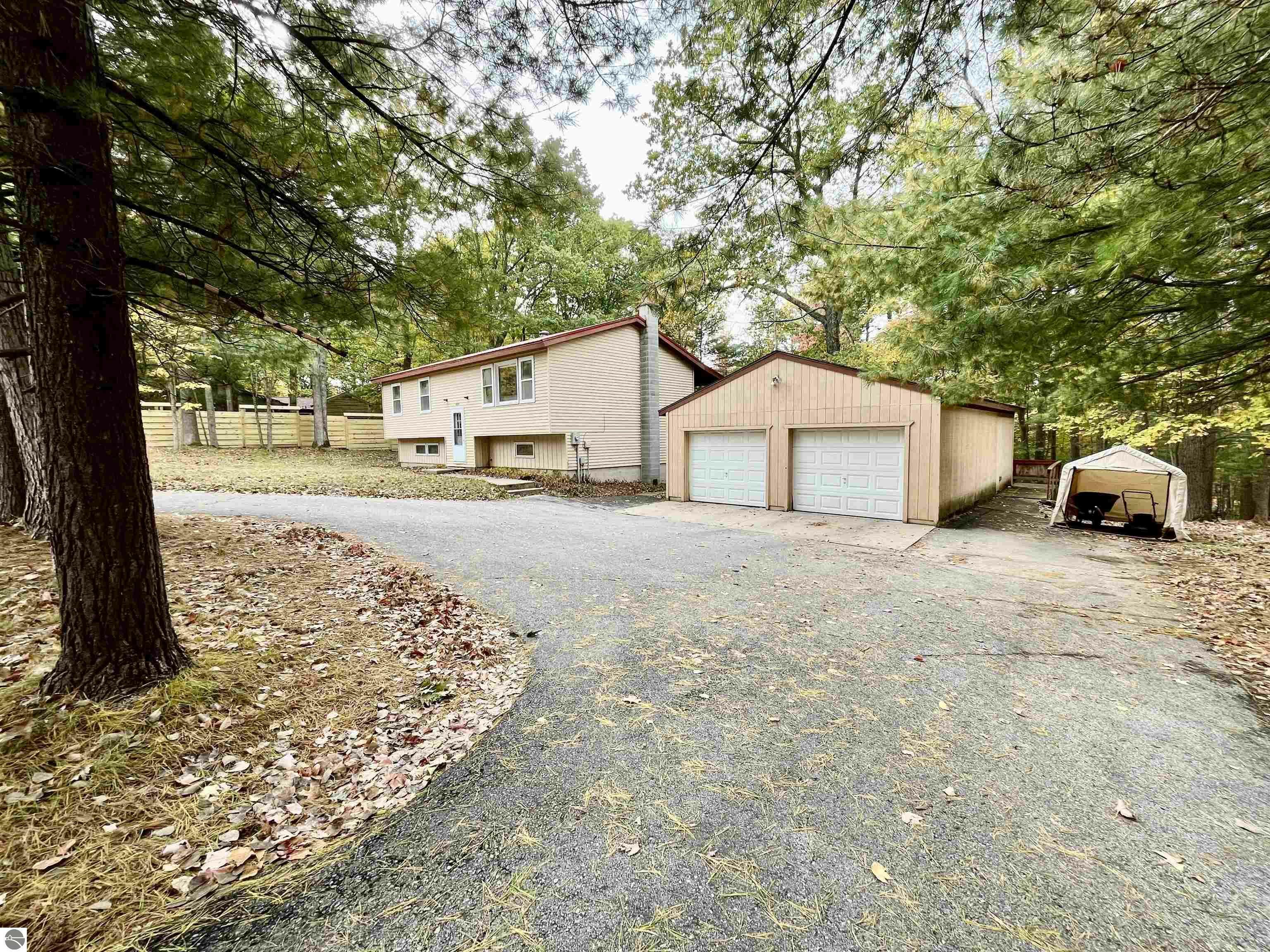 Property Photo:  3878 Forest Lakes Drive  MI 49696 