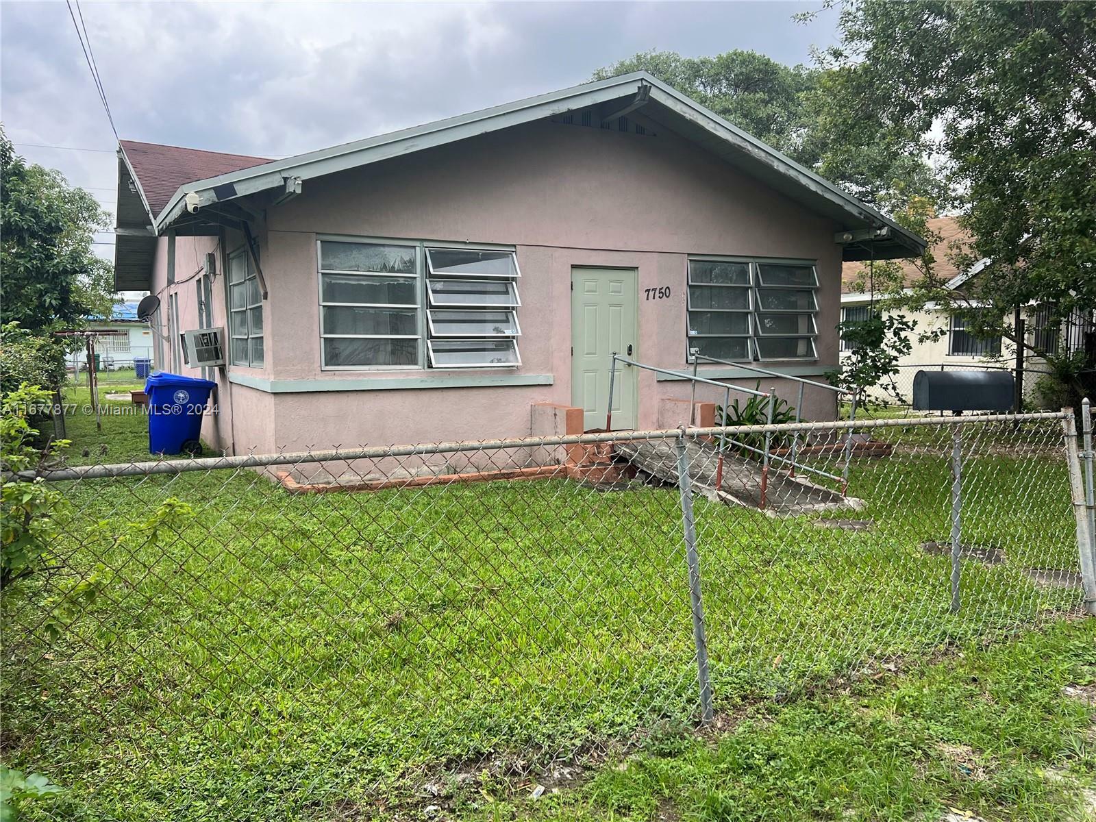 Property Photo:  7750 NW Miami Pl  FL 33150 