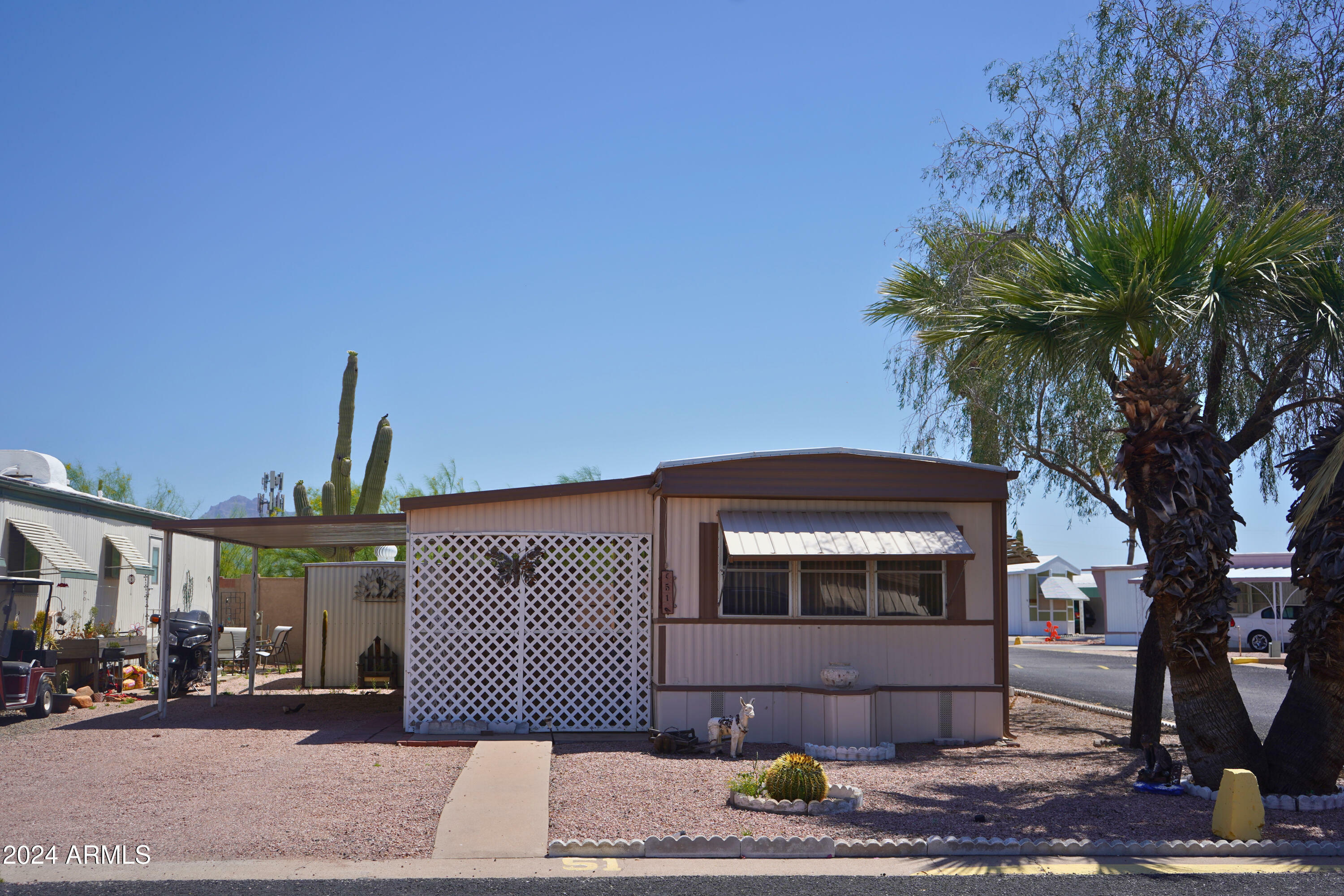 Property Photo:  11435 E Apache Trail 51  AZ 85120 