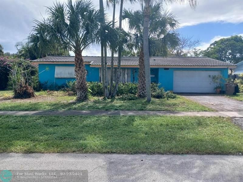 Property Photo:  500 SE 3rd Pl  FL 33441 