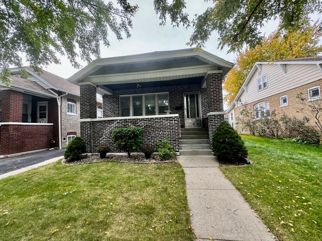 Property Photo:  5052 N Menard Avenue  IL 60630 