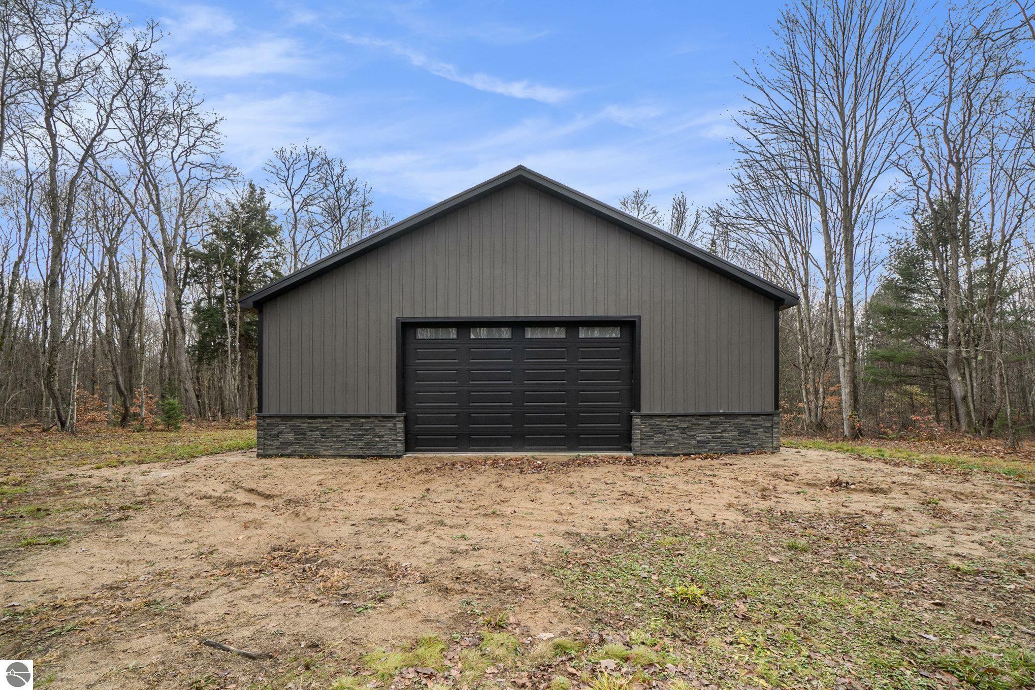 Property Photo:  7068 NE Covert Road  MI 49659 