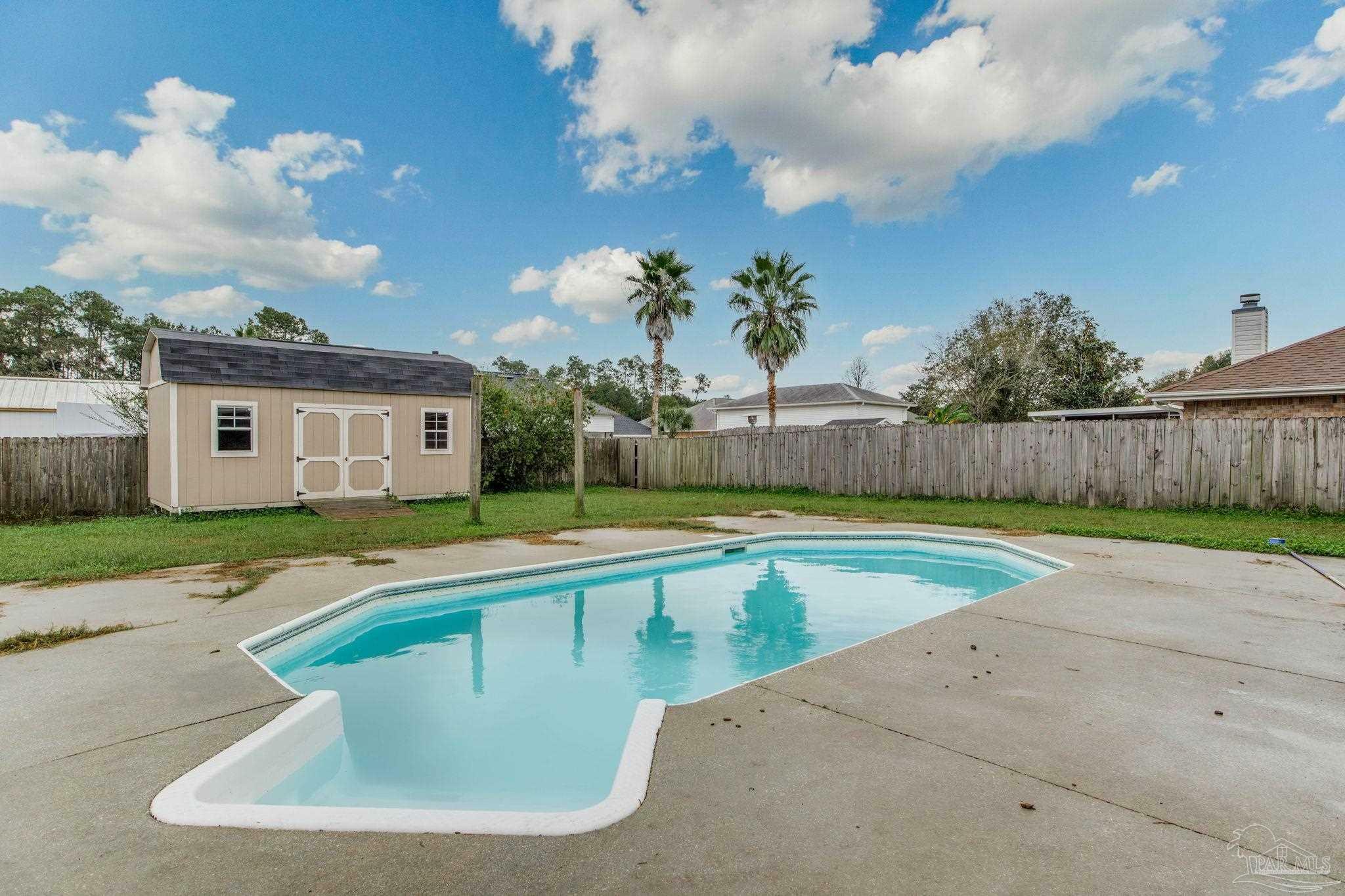 Property Photo:  9786 Harlington St  FL 32533 