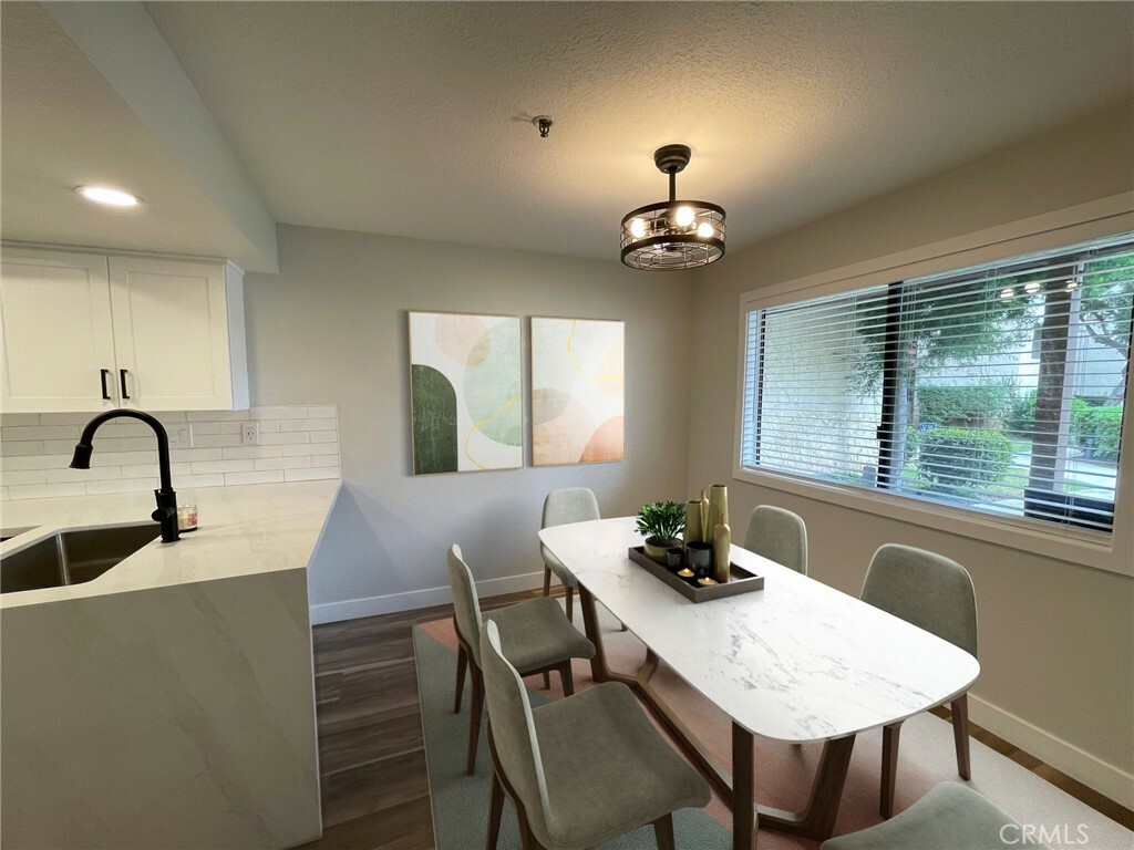 Property Photo:  7715 Newman Avenue 104  CA 92647 