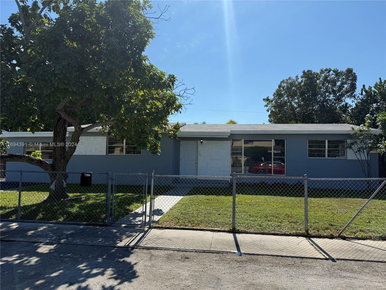 Property Photo:  954 W 72nd Pl  FL 33014 