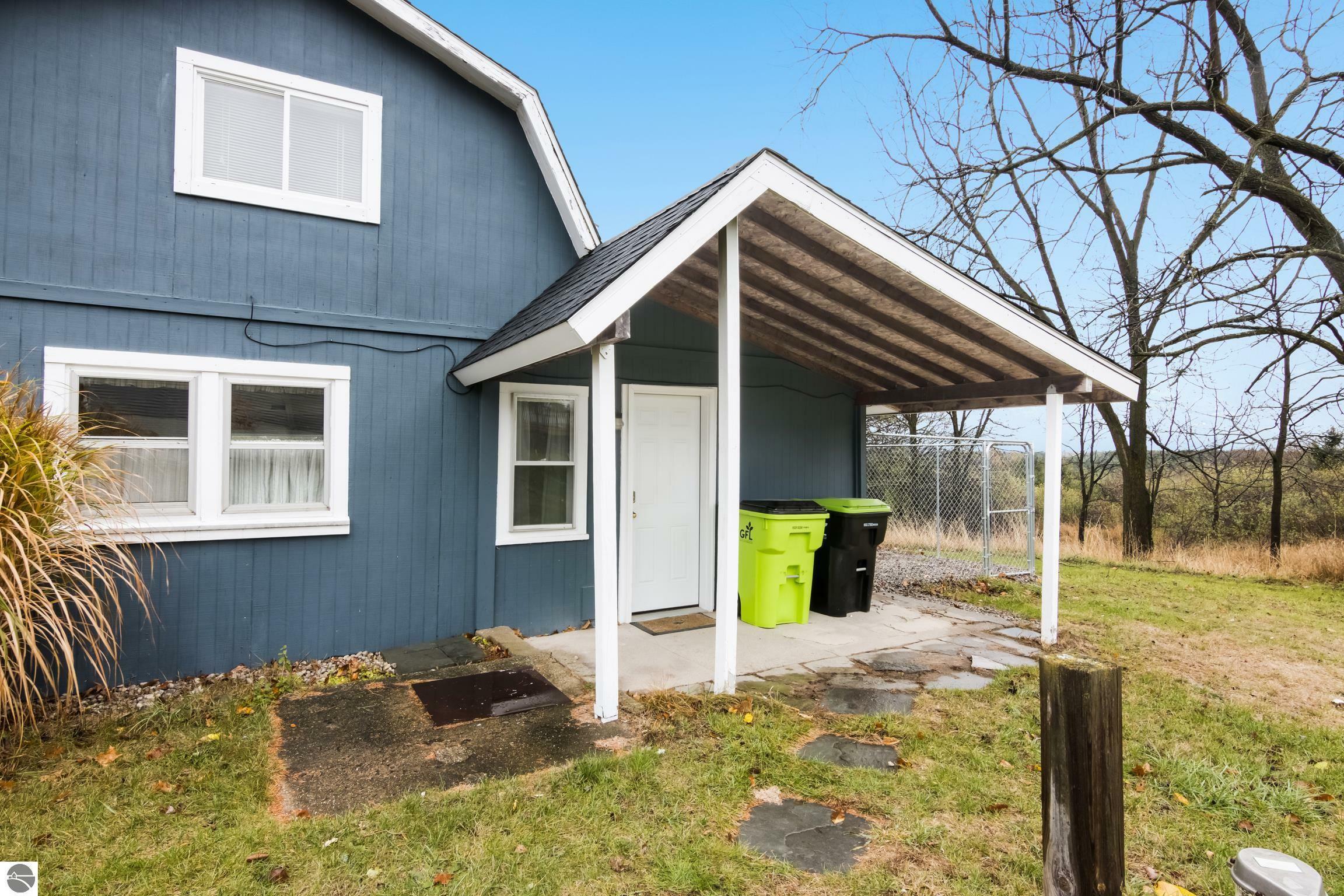 Property Photo:  4866 Bartlett Road  MI 49690-9233 