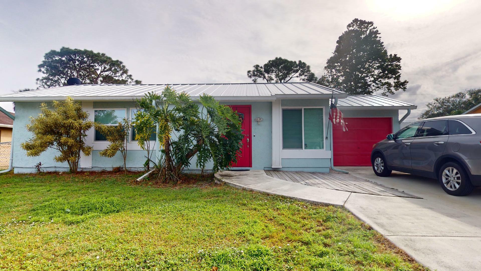 Property Photo:  486 NW Archer Avenue  FL 34983 