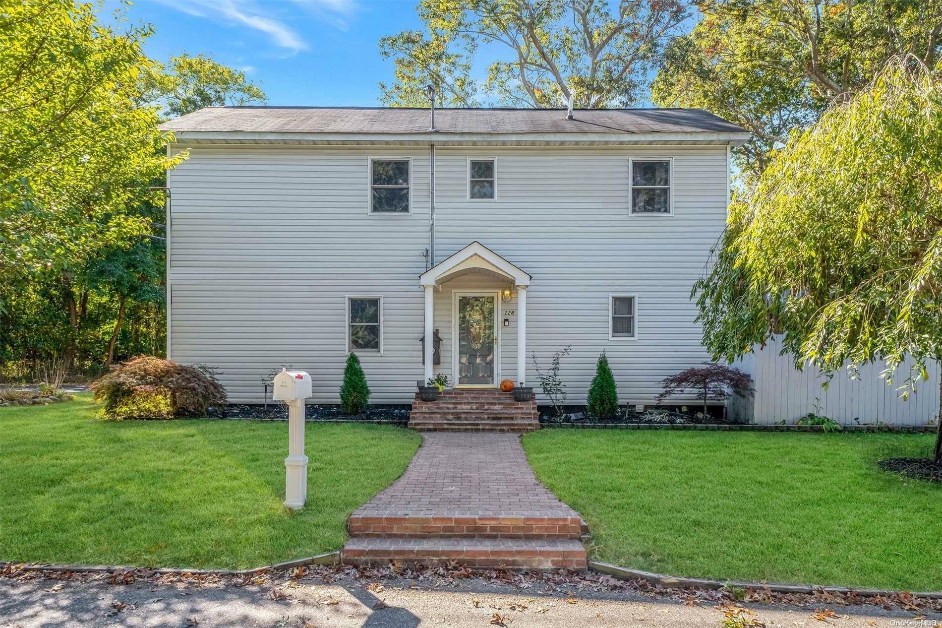 Property Photo:  228 Blue Point Road  NY 11738 