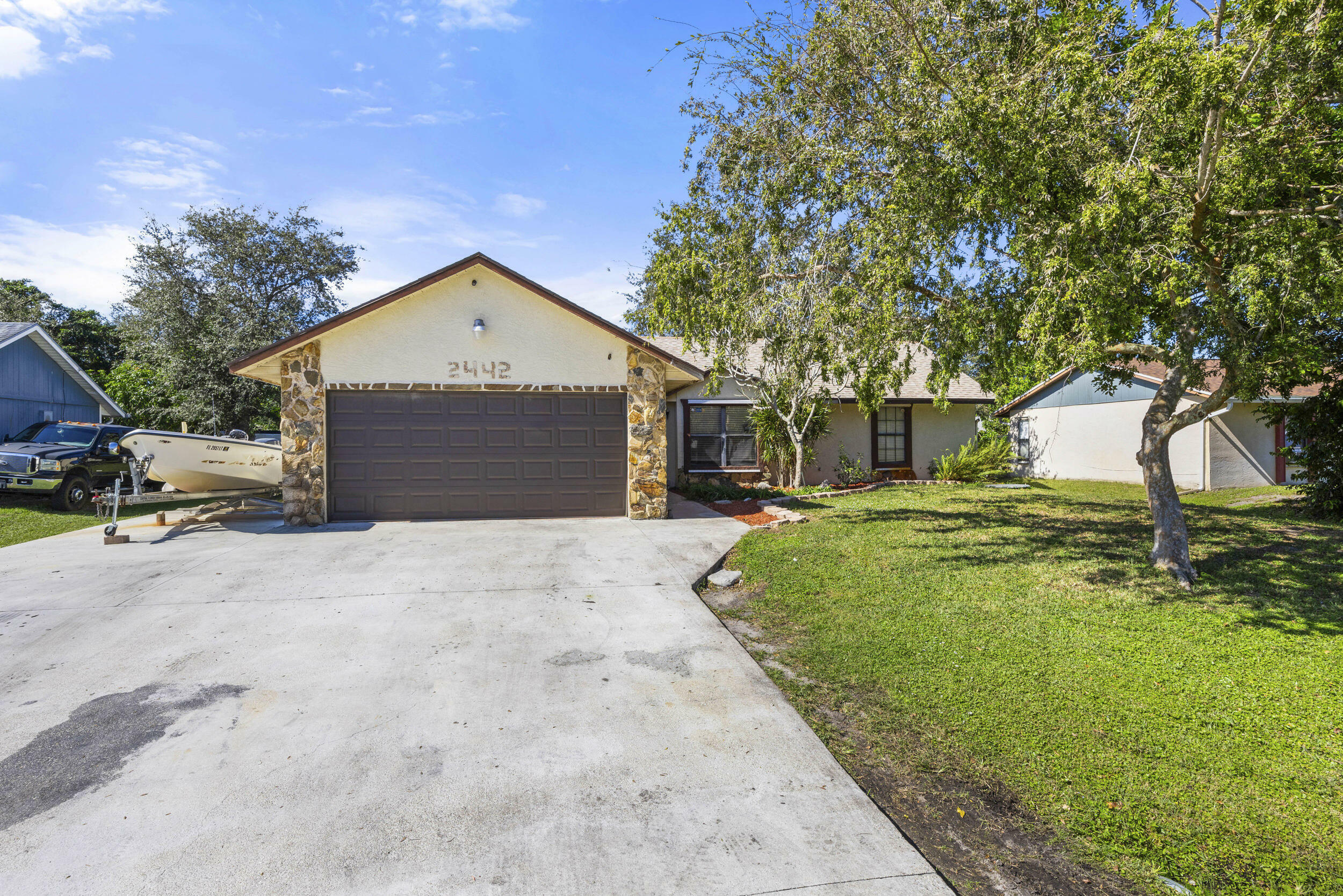 Property Photo: 2442 SW Lafayette Street FL 34984