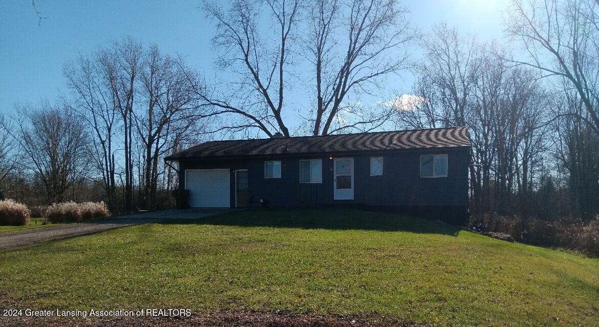 Property Photo:  100 E Haslett Road  MI 48840 