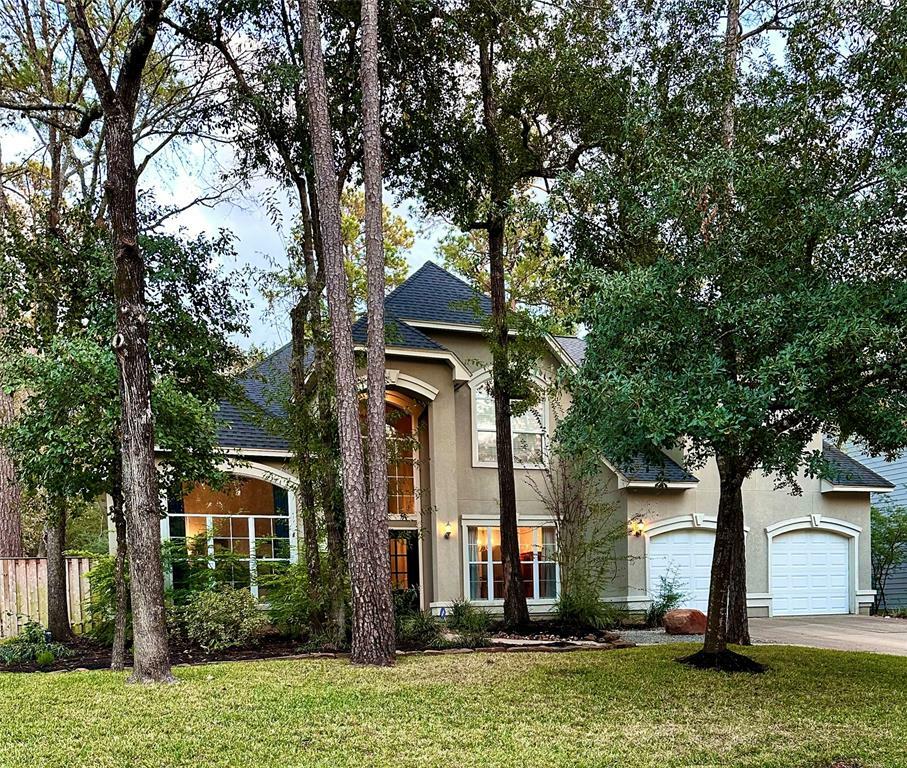 Property Photo:  30 Candle Pine Place  TX 77381 