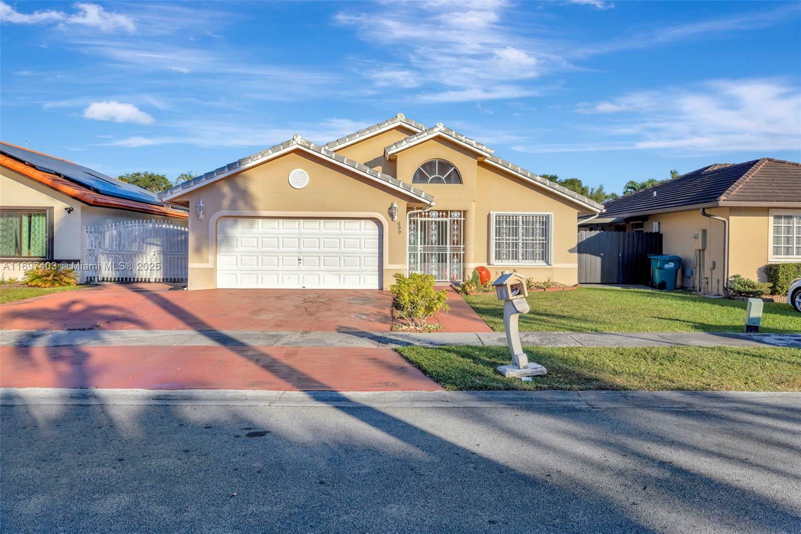 Property Photo: 699 NW 134th Pl FL 33182