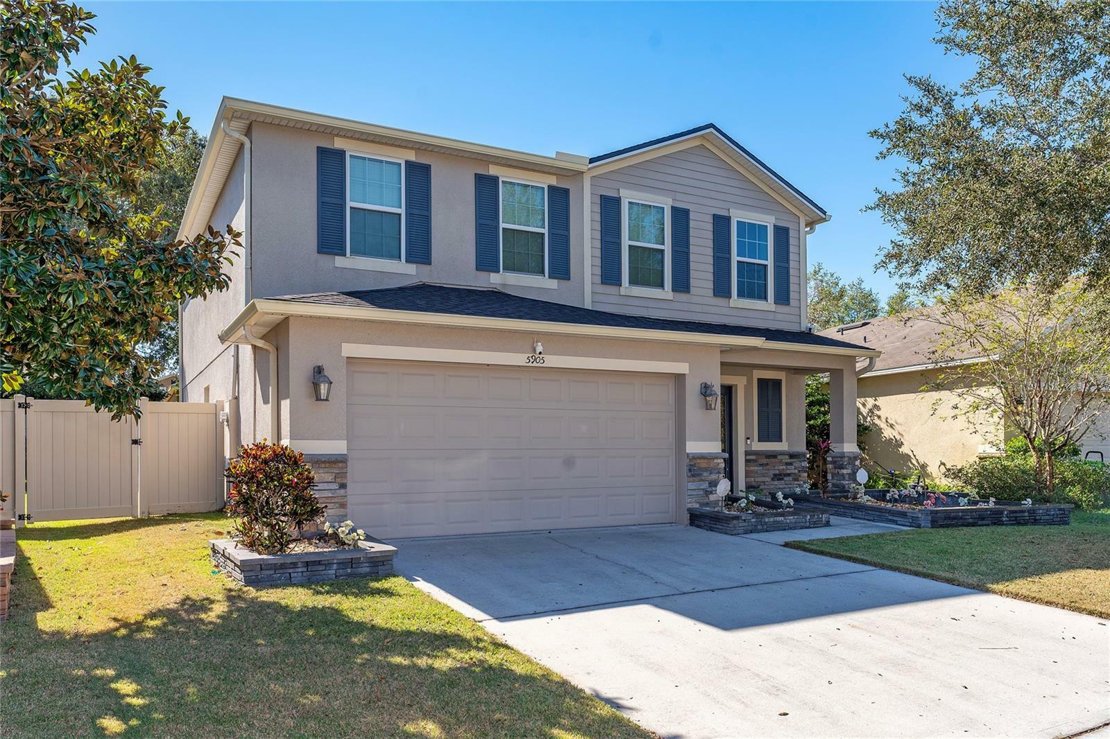 Property Photo: 5905 Windsong Oak Drive FL 34748