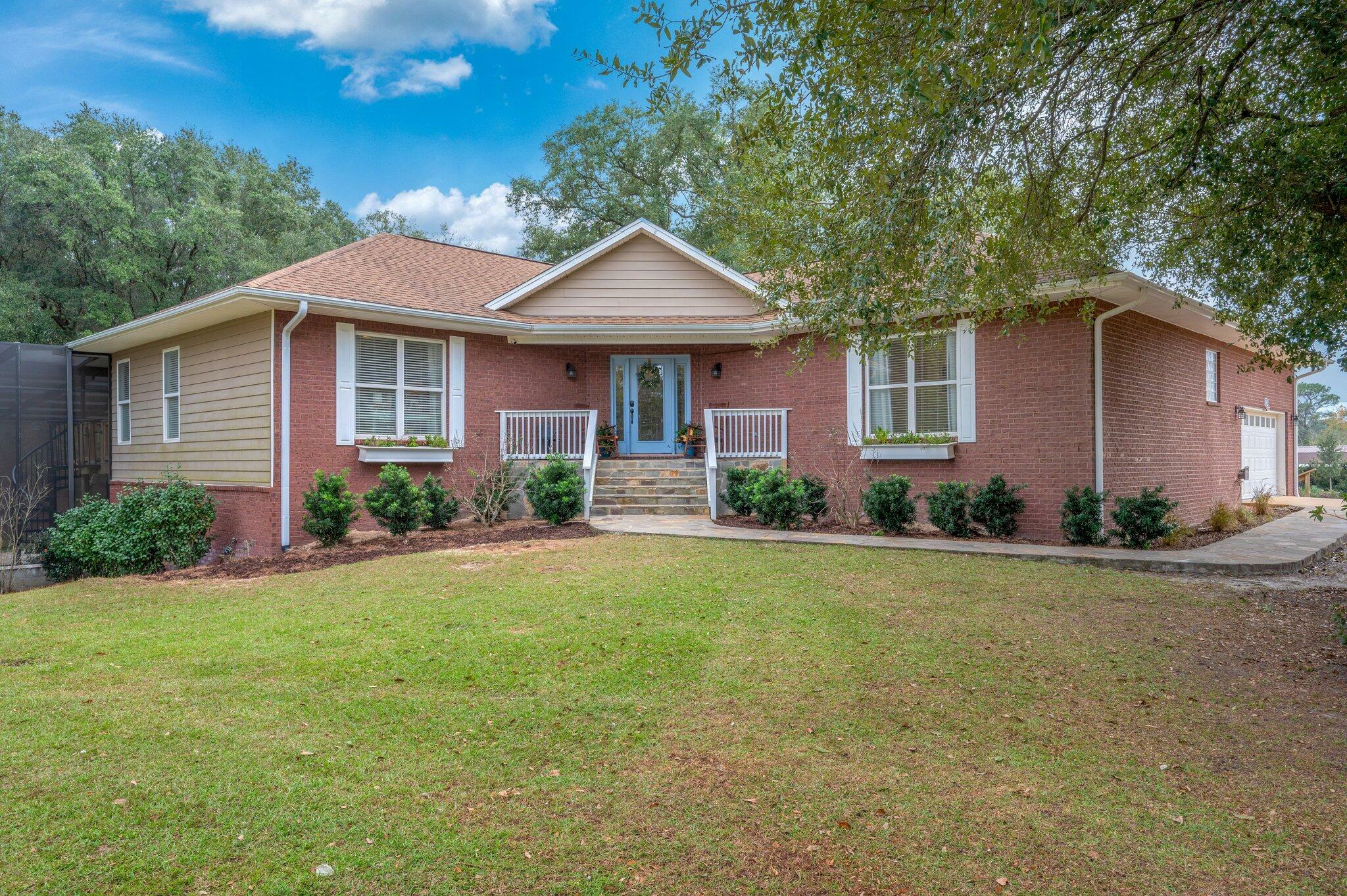 Property Photo:  6265 Holloway Road  FL 32531 