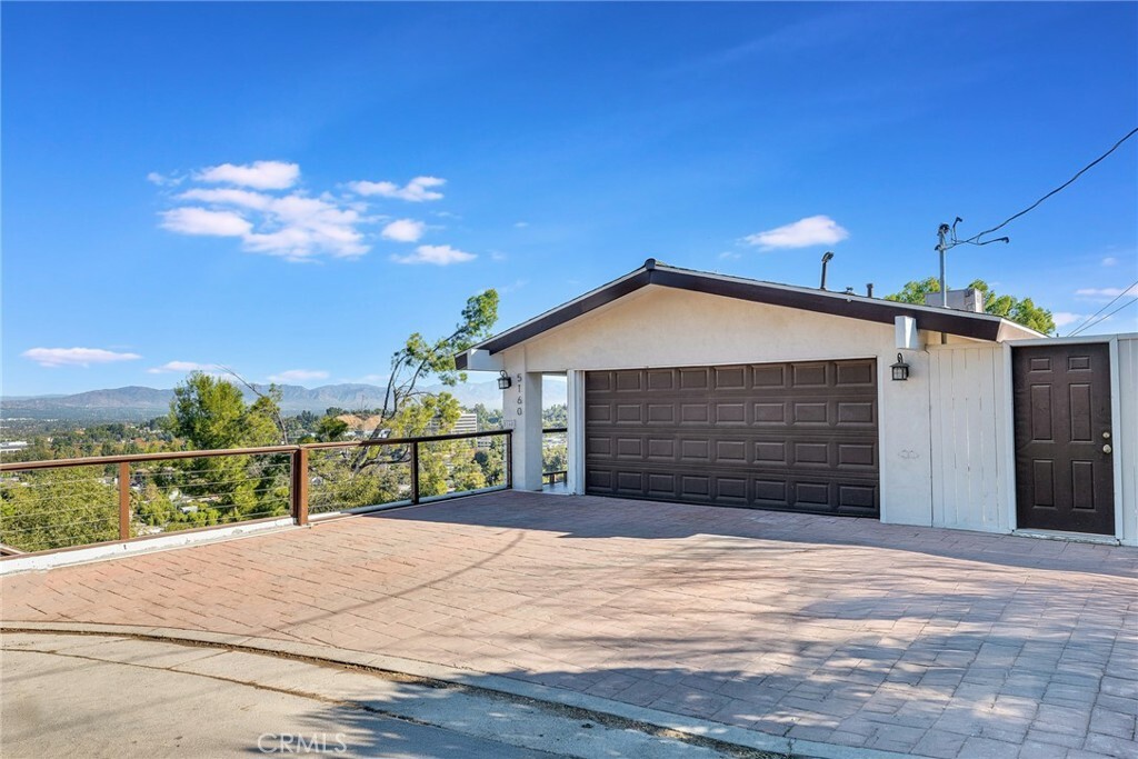 Property Photo:  5160 Medina Road  CA 91364 